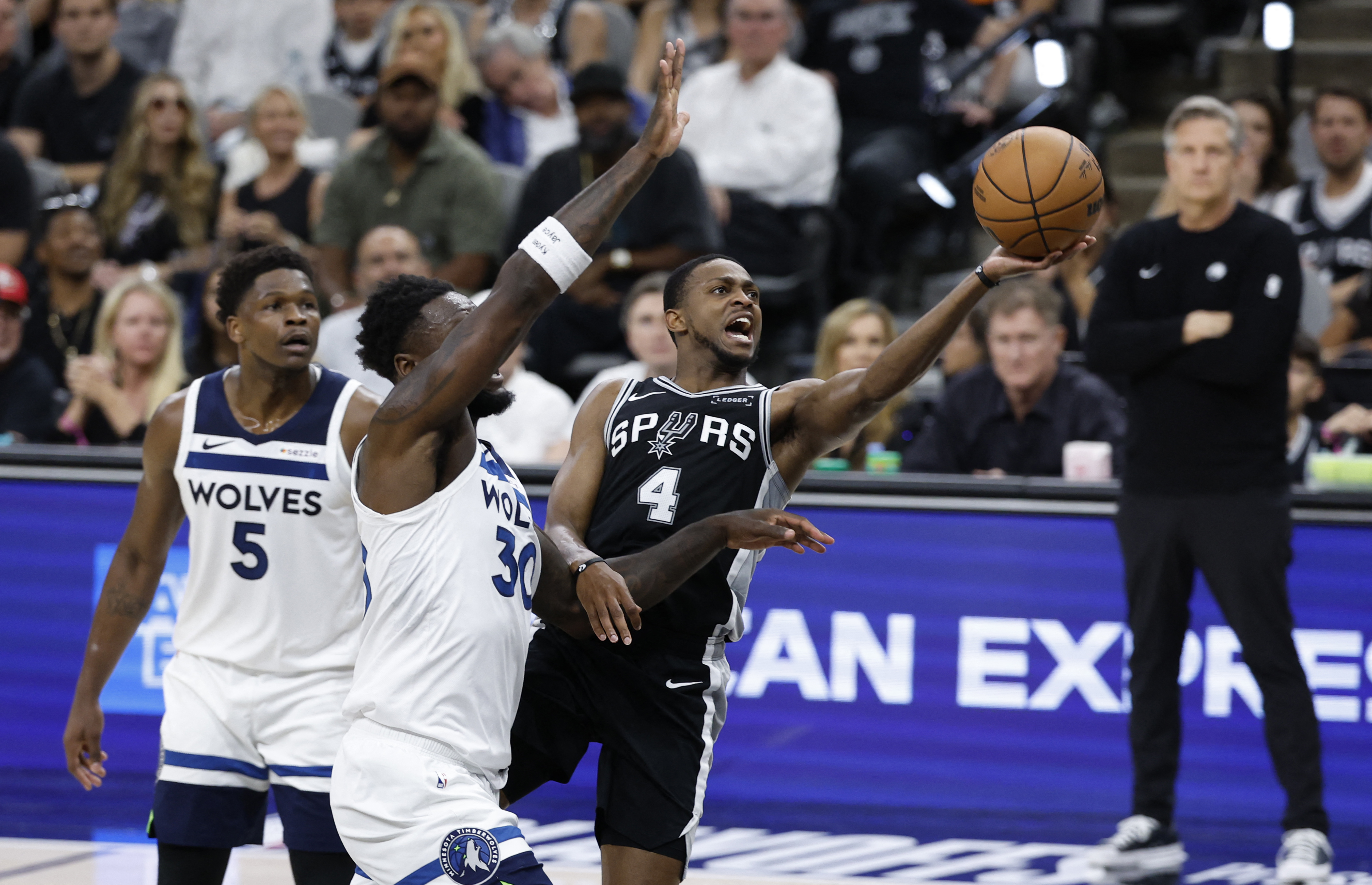 SAN ANTONIO, TX -MAY 12: De'Aaron Fox drives past Julius Randle #30 of the Minnesota Timberwolves in the first half of Game Five of the Western Conference Semifinals NBA Playoffs at Frost Bank Center on May 12, 2026 in San Antonio, Texas. NOTE TO USER: User expressly acknowledges and agrees that, by downloading and or using this photograph, User is consenting to terms and conditions of the Getty Images License Agreement. Ronald Cortes/Getty Images/AFP (Photo by Ronald Cortes / GETTY IMAGES NORTH AMERICA / Getty Images via AFP)