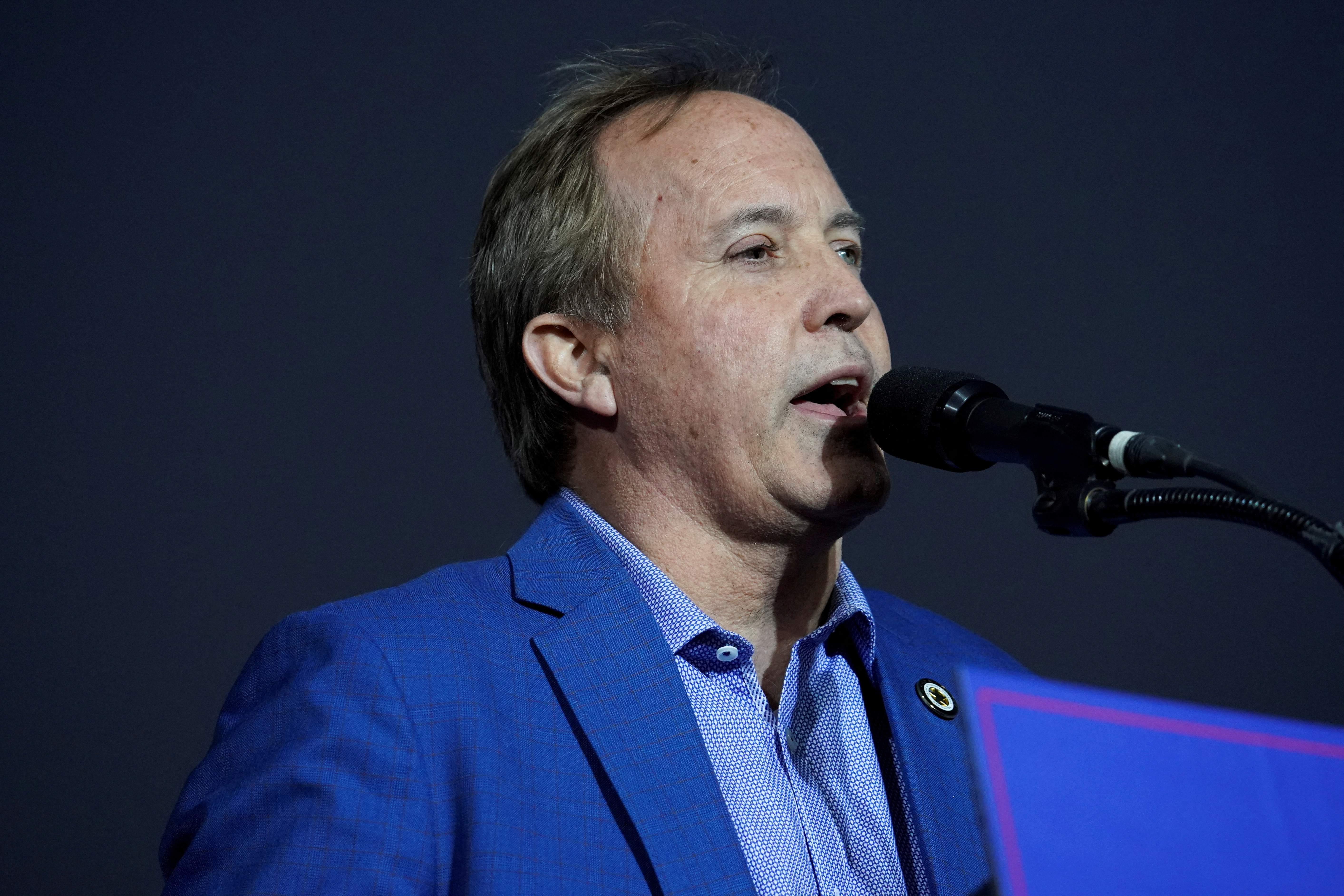 FILE PHOTO: Attorney General of Texas Ken Paxton speaks during former U.S. President Donald Trump's rally, in Conroe, Texas, U.S., January 29, 2022. REUTERS/Go Nakamura?/File Photo