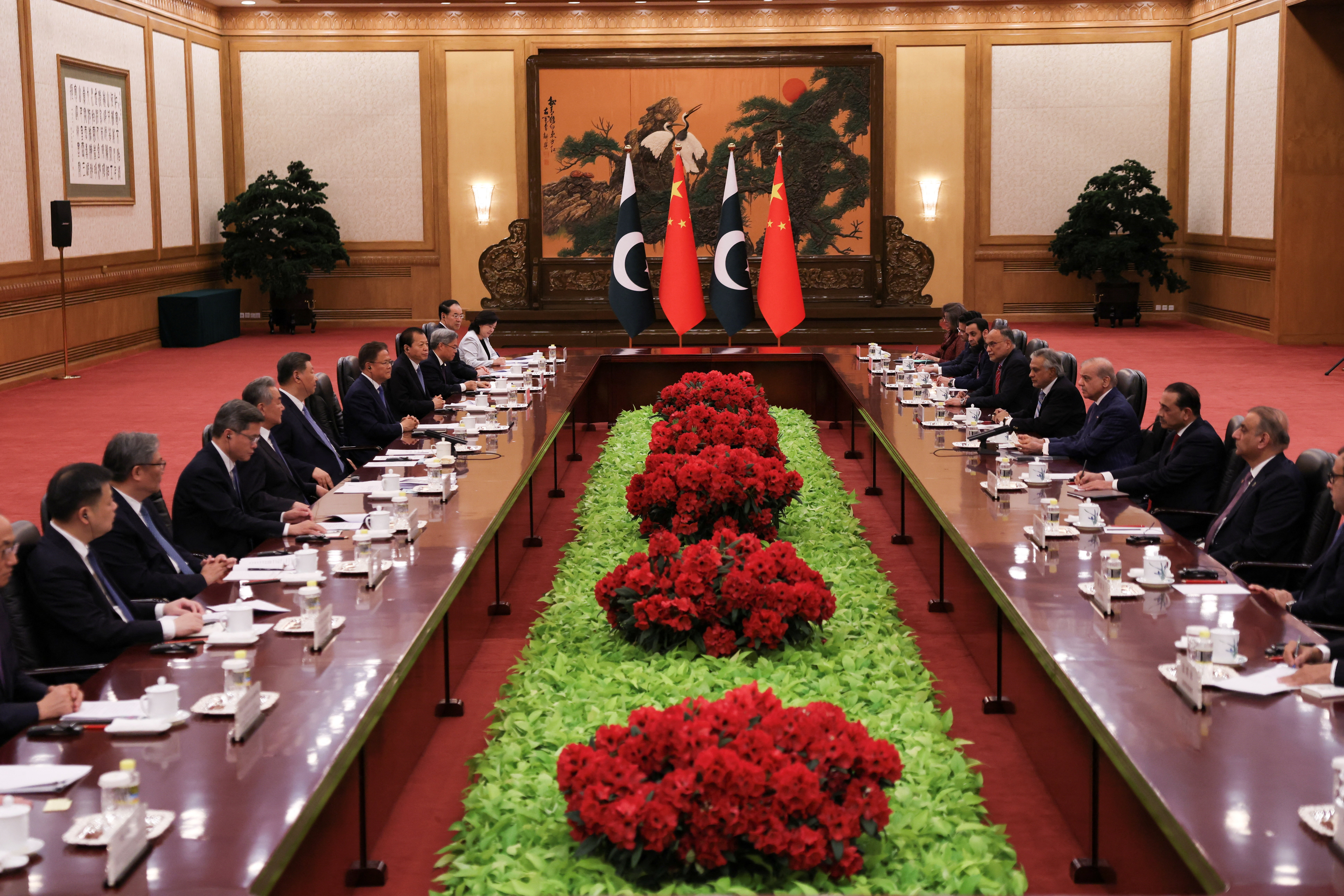 Chinese President Xi Jinping and Pakistan's Prime Minister Shehbaz Sharif attend a meeting at the Great Hall of the People, in Beijing, China May 25, 2026. REUTERS/Tingshu Wang/Pool