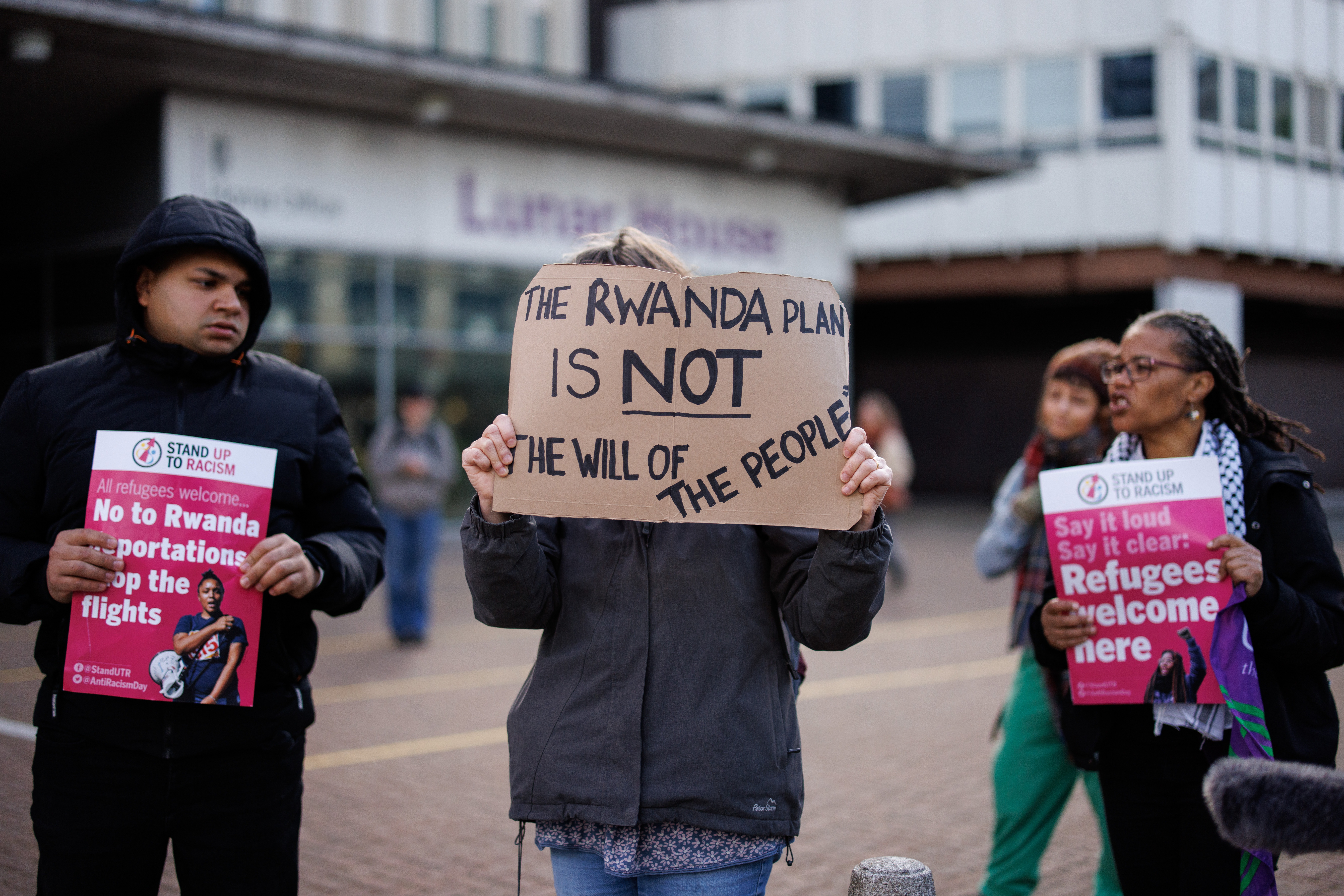 Campaigners protest against the British government's Rwanda deportation scheme outside a Home Office immigration reporting center in Croydon, south London, Britain, 29 April 2024. [Tolga Akmen/EPA]