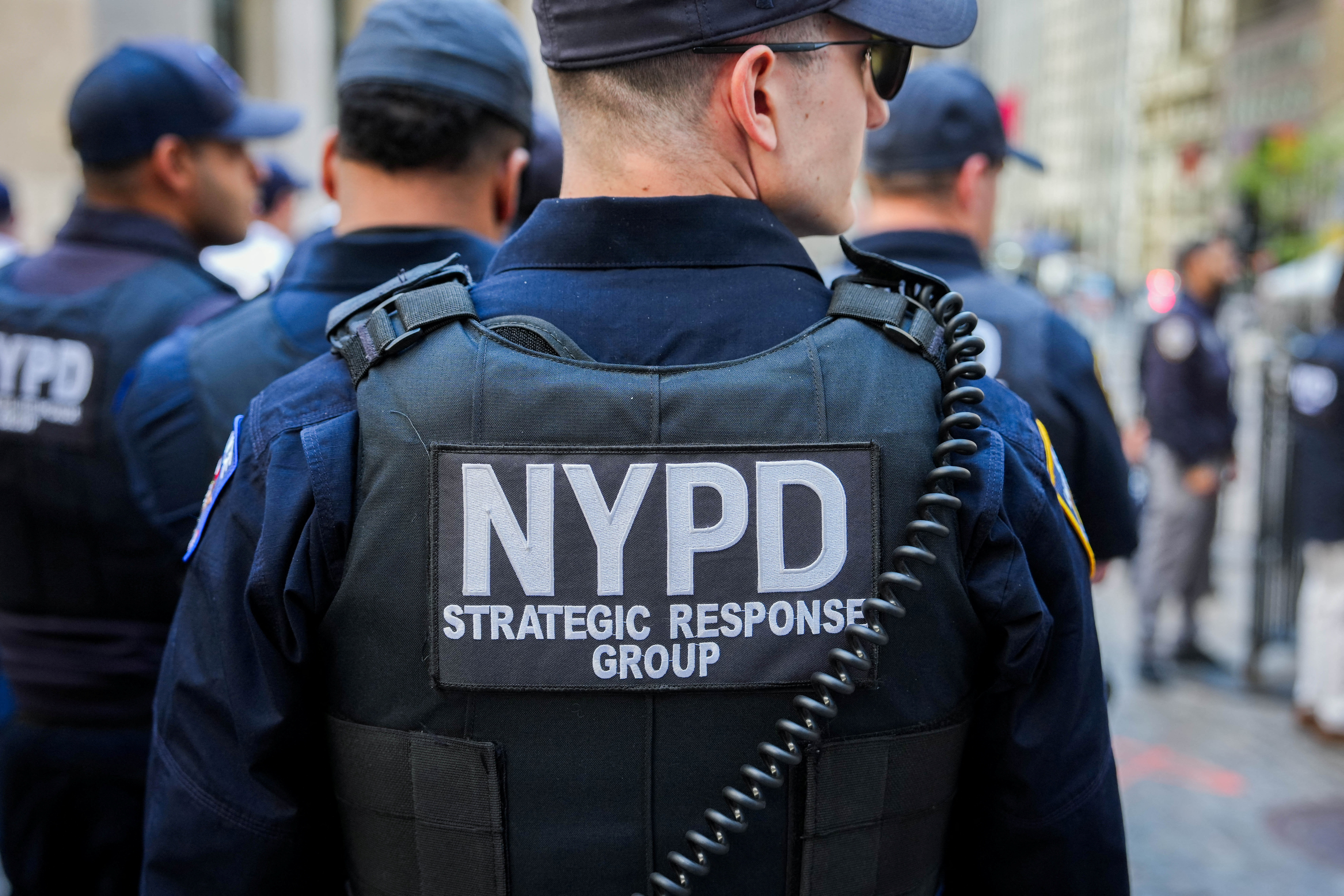 A member of New York City Police Department (NYPD) Strategic Response Group (SRG) outside of the New York Stock Exchange (NYSE) on May Day in Manhattan, New York City, U.S., May 1, 2026. REUTERS/Adam Gray
