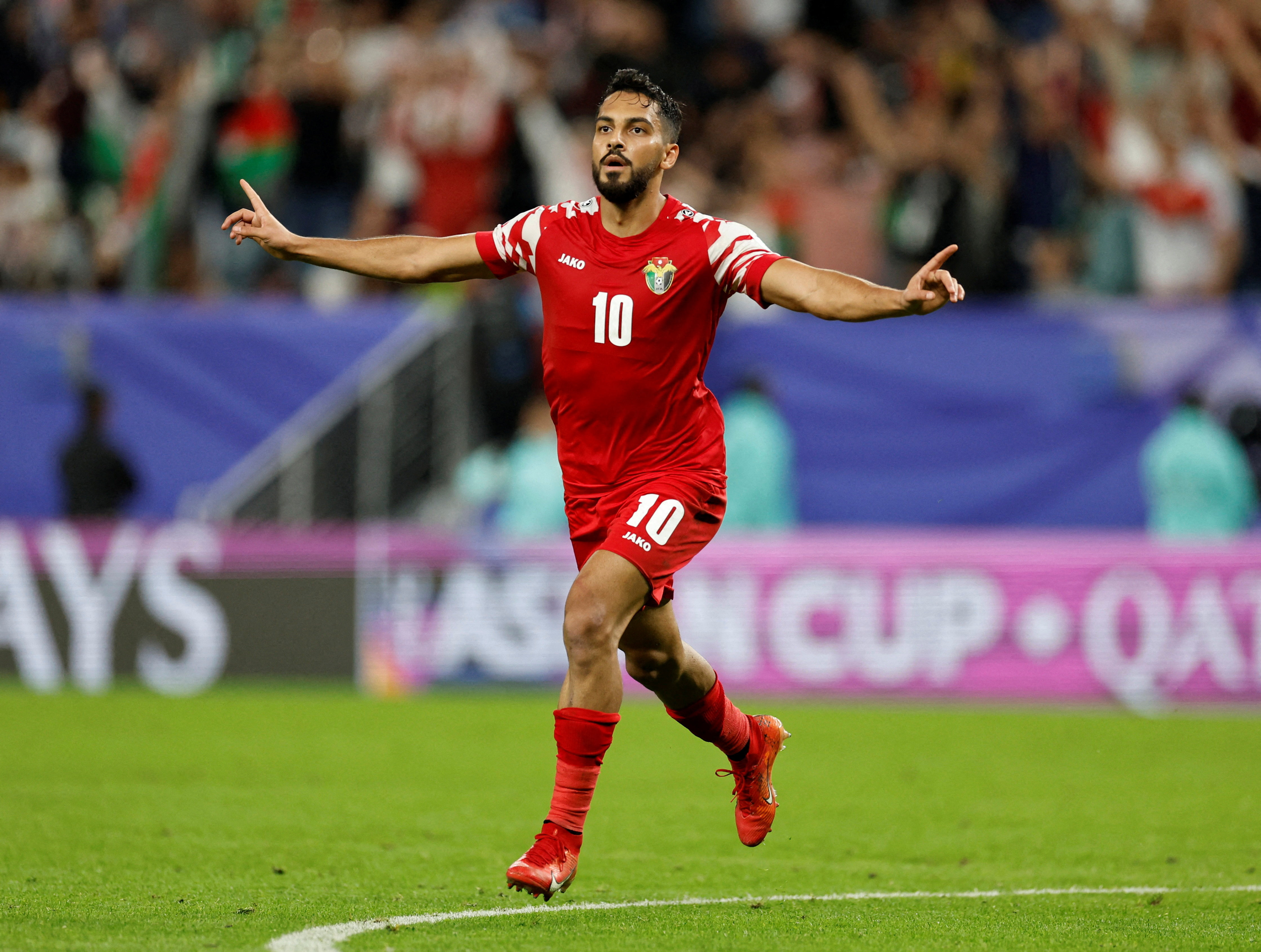 Mousa Al Tamari celebrating
