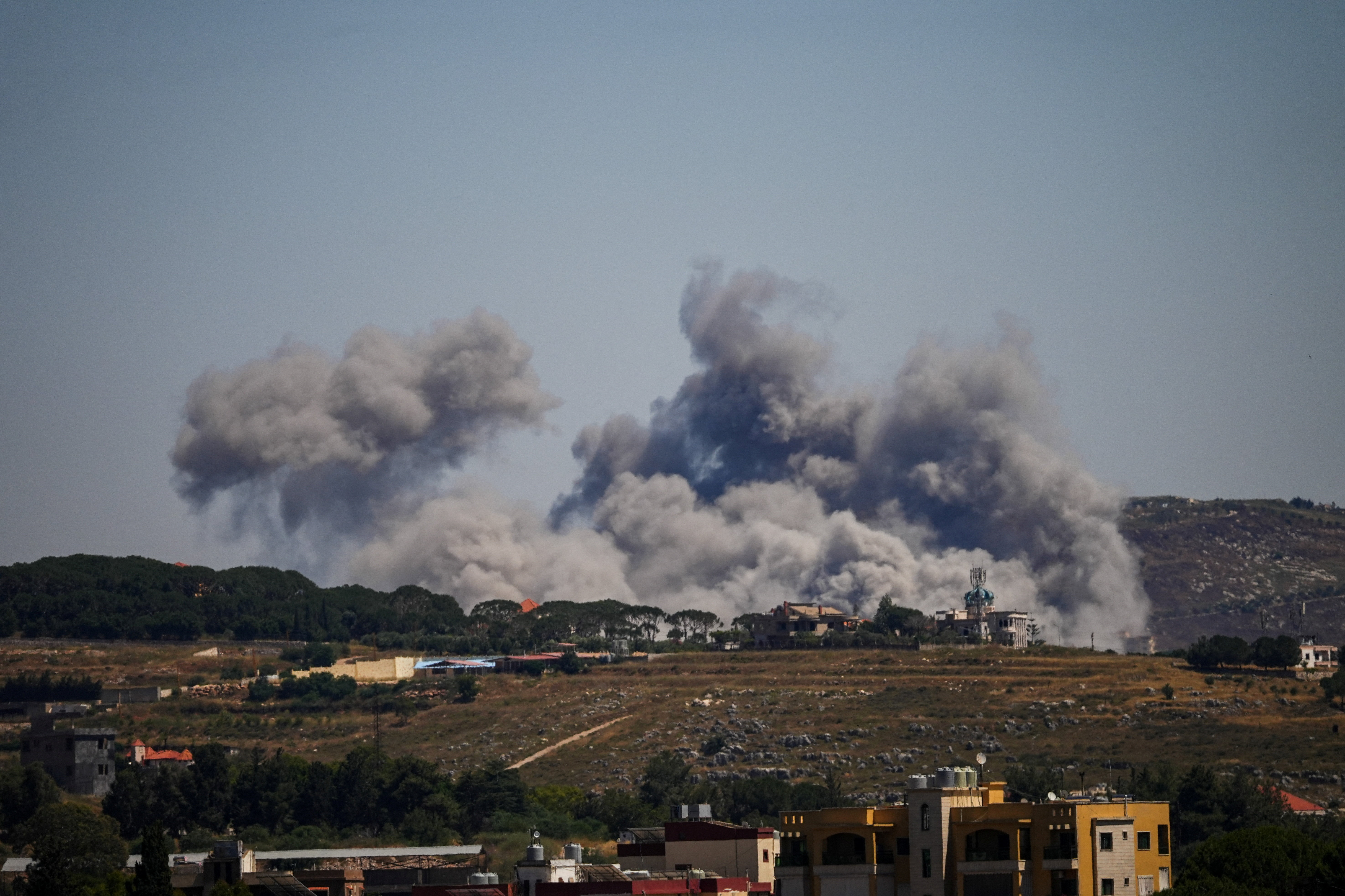 Smoke billows from southern Lebanon, following Israeli strikes, as seen from Nabatieh, Lebanon,
