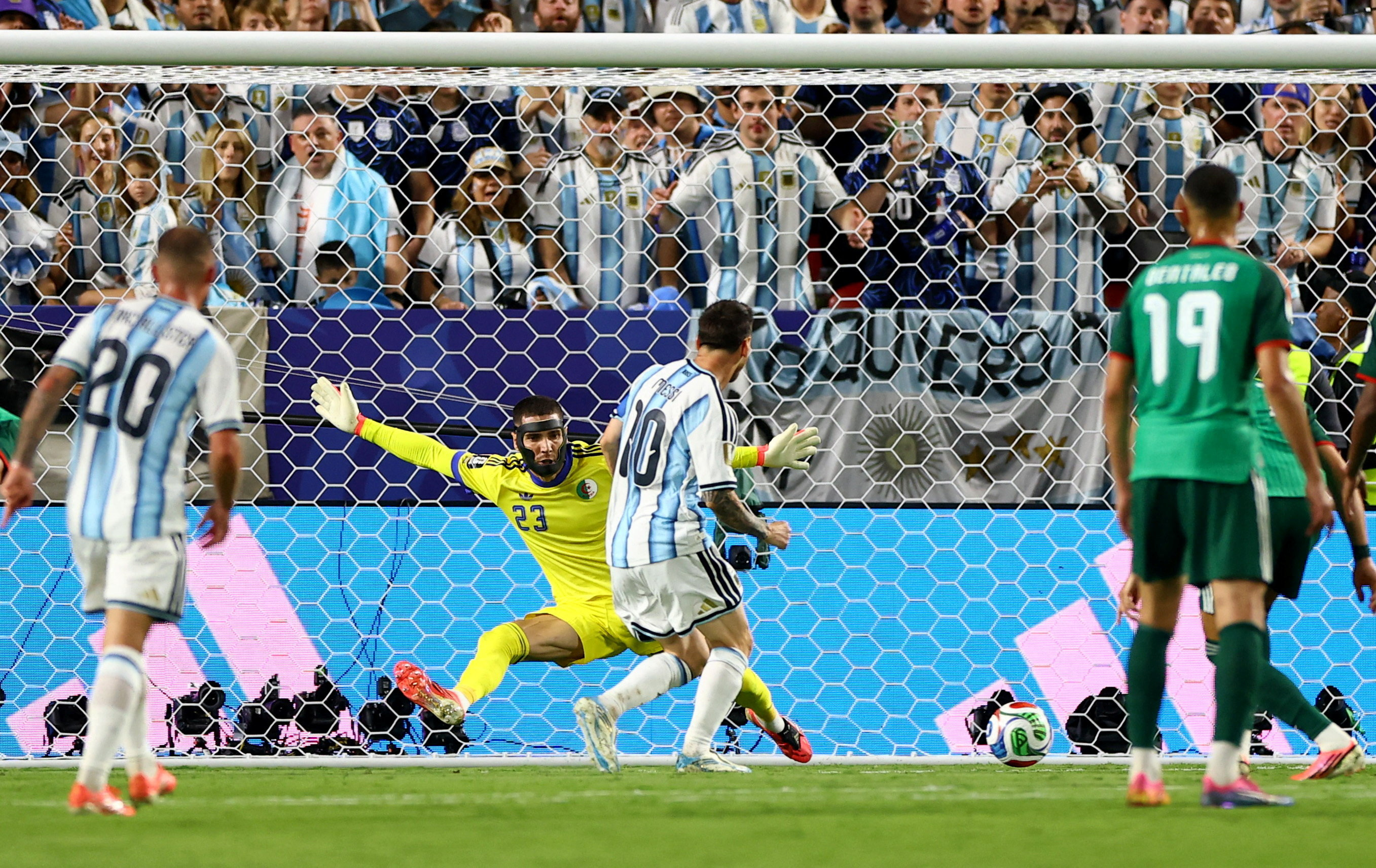 Argentina's Lionel Messi scores their second goal