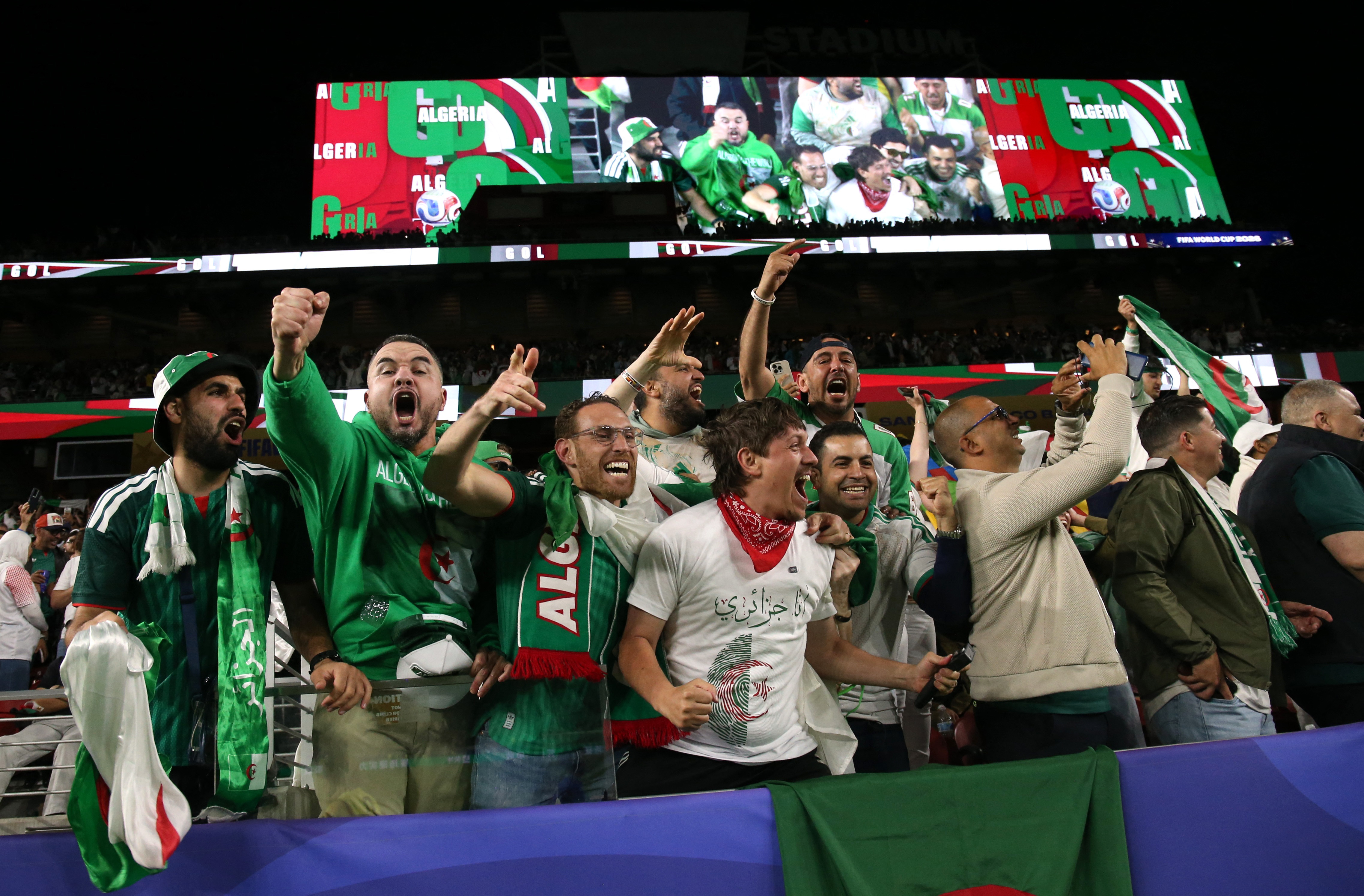 Soccer Football - FIFA World Cup 2026 - Group J - Jordan v Algeria - San Francisco Bay Area Stadium, Santa Clara, California, U.S. - June 22, 2026 Algeria fans celebrate in the stands after Amine Gouiri scores their second goal IMAGN IMAGES via Reuters/David Gonzales