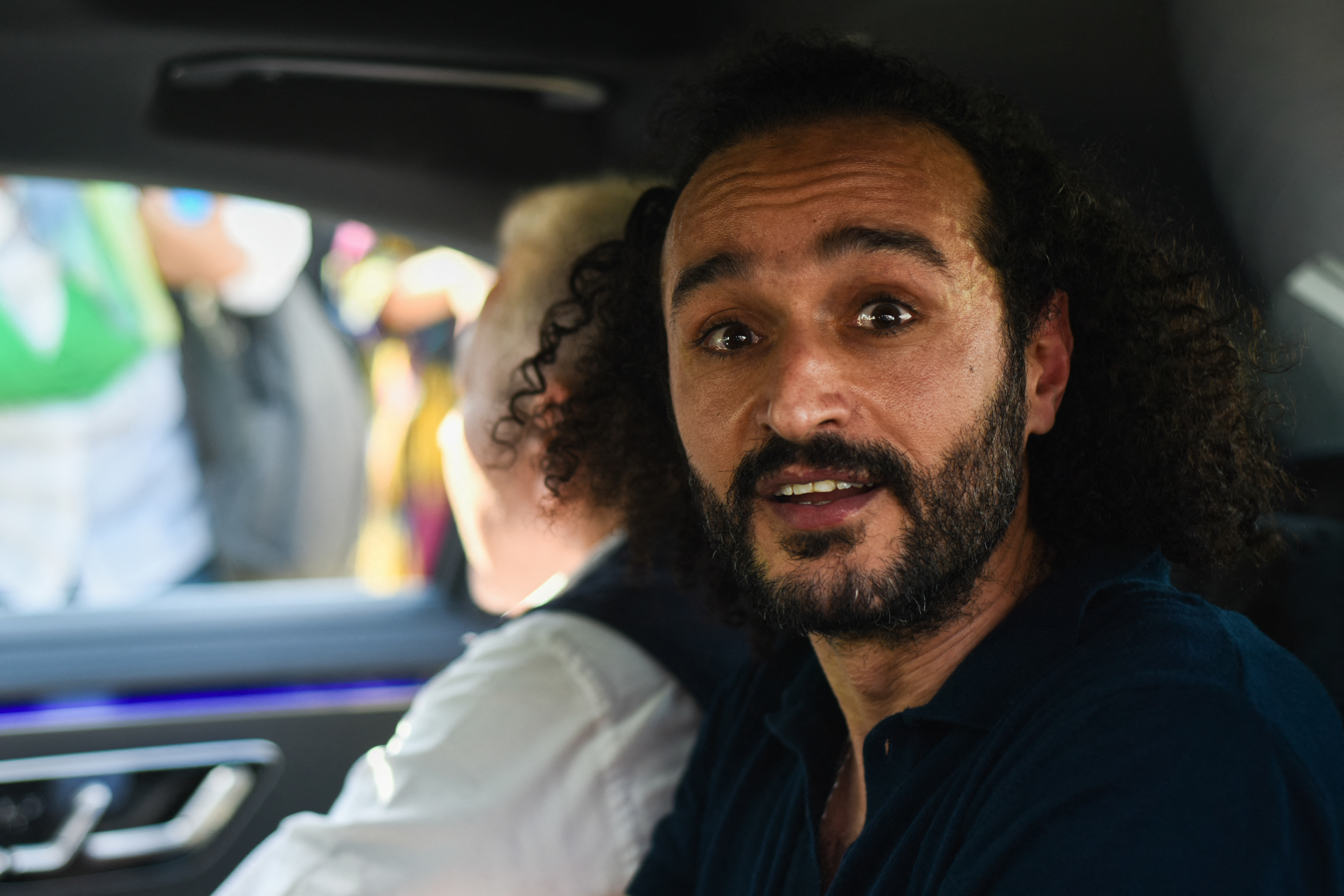 Egyptian activist Ahmed Douma is pictured in a car following his release from prison on August 19, 2023.
