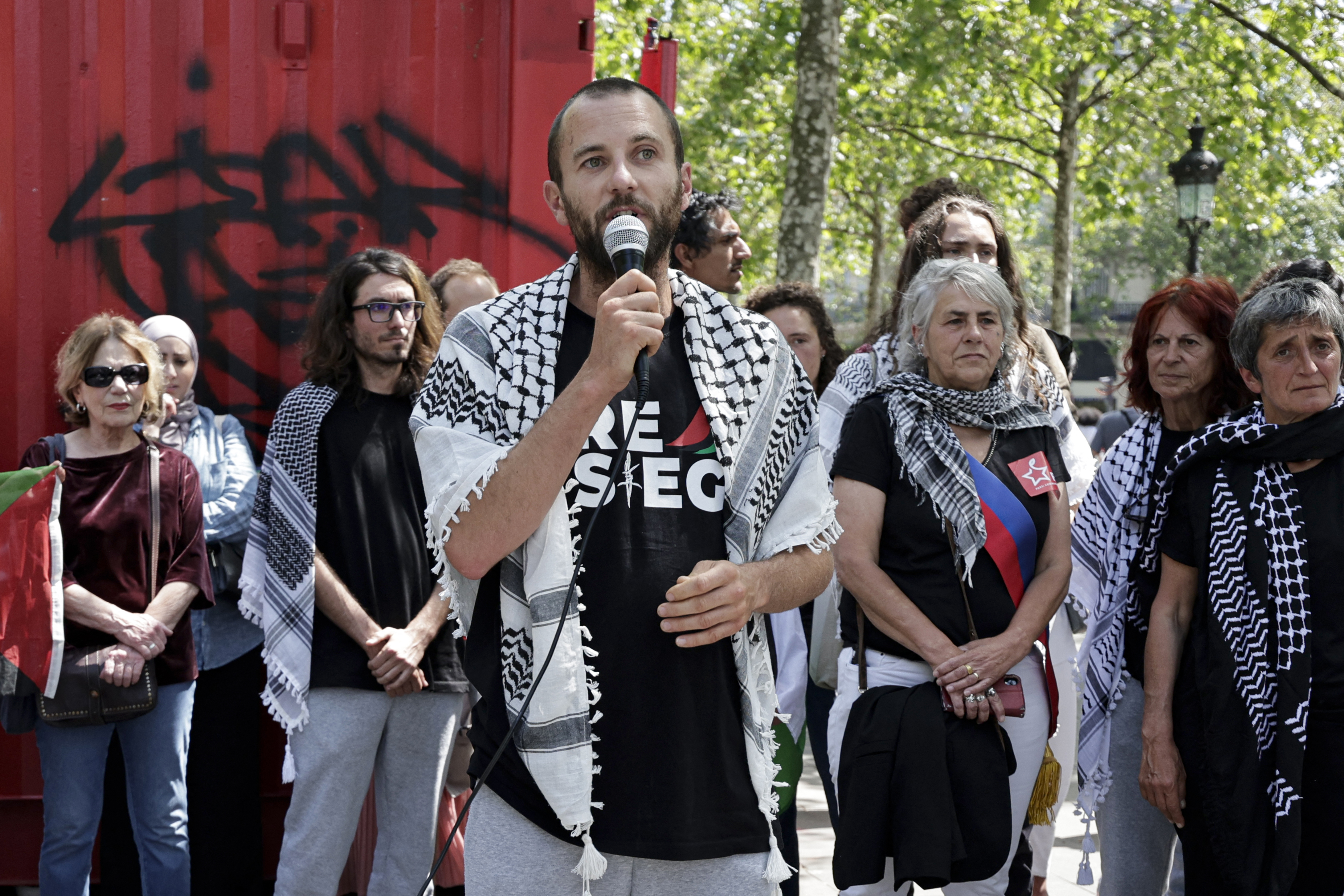 Adrien, a French sailor and member of the Global Sumud flotilla, speaks as French activists of the flotilla and protesters gather to take part in a pro-Palestinian demonstration in Paris, France on May 23, 2026.