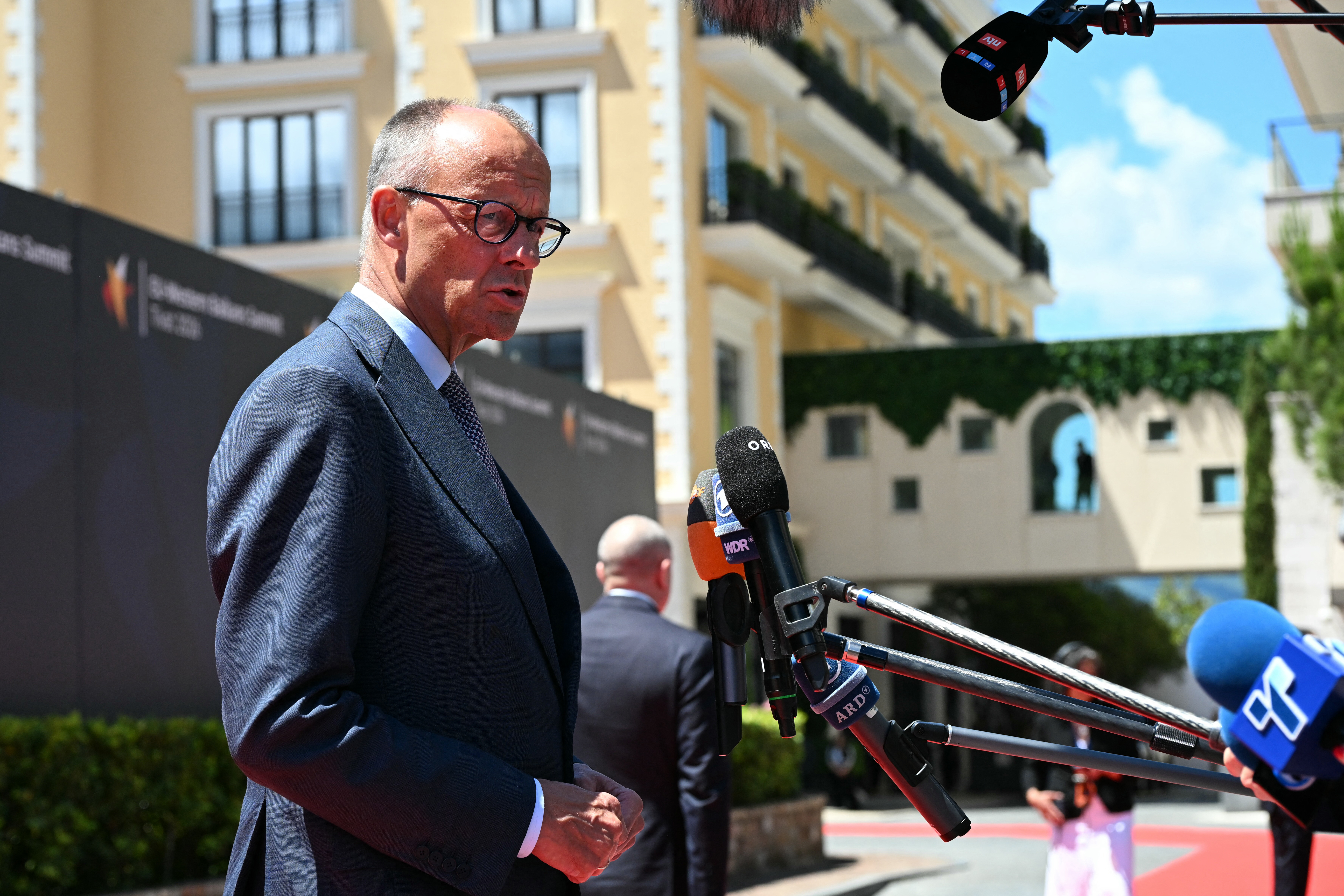 Germany's Chancellor Friedrich Merz makes a press statement ahead of the EU-Western Balkans Summit at Porto Montenegro in Tivat on June 5, 2026.