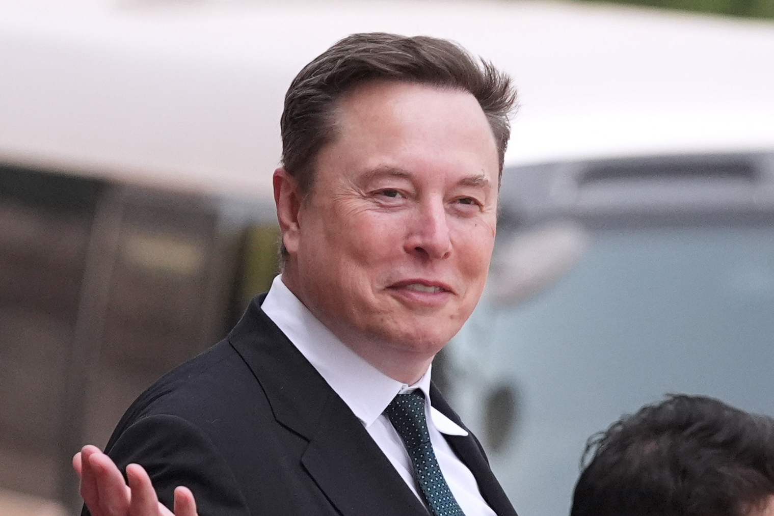 Elon Musk departs after a welcome ceremony with US President Donald Trump and China’s President Xi Jinping at the Great Hall of the People, in Beijing, China, on May 14, 2026