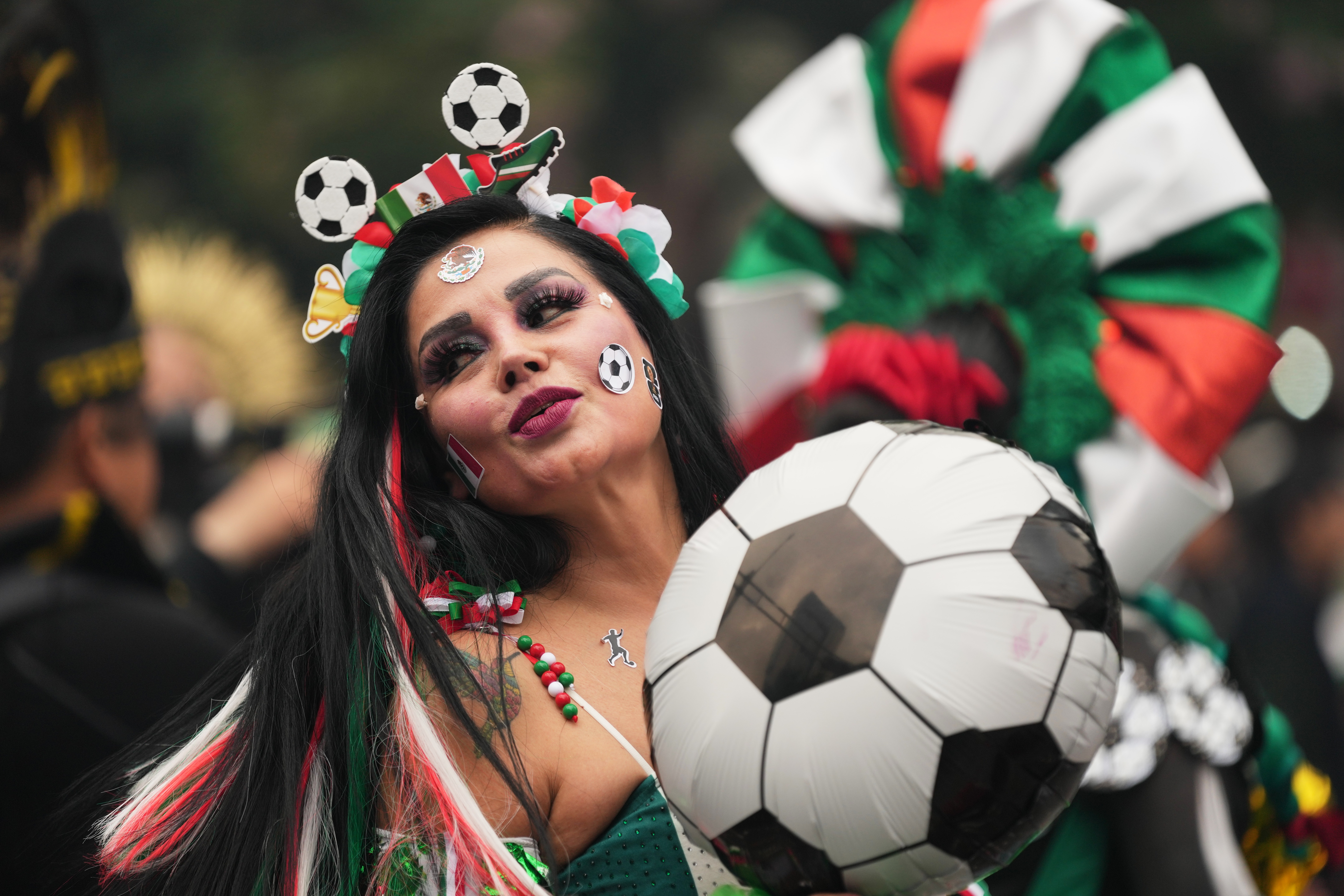 A dancer performs along Reforma Avenue in Mexico City