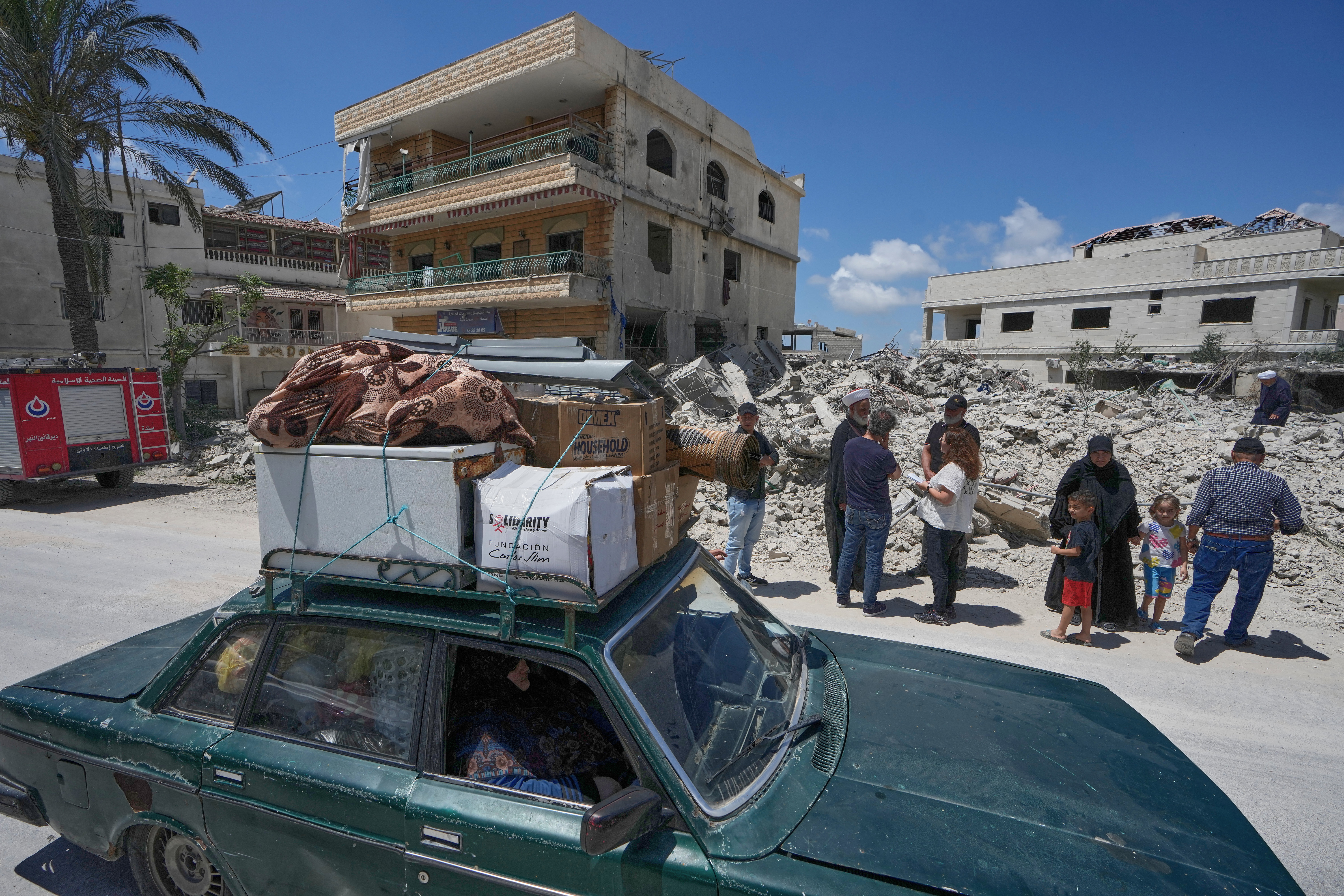 Families return to shattered towns as fragile ceasefire holds in Lebanon