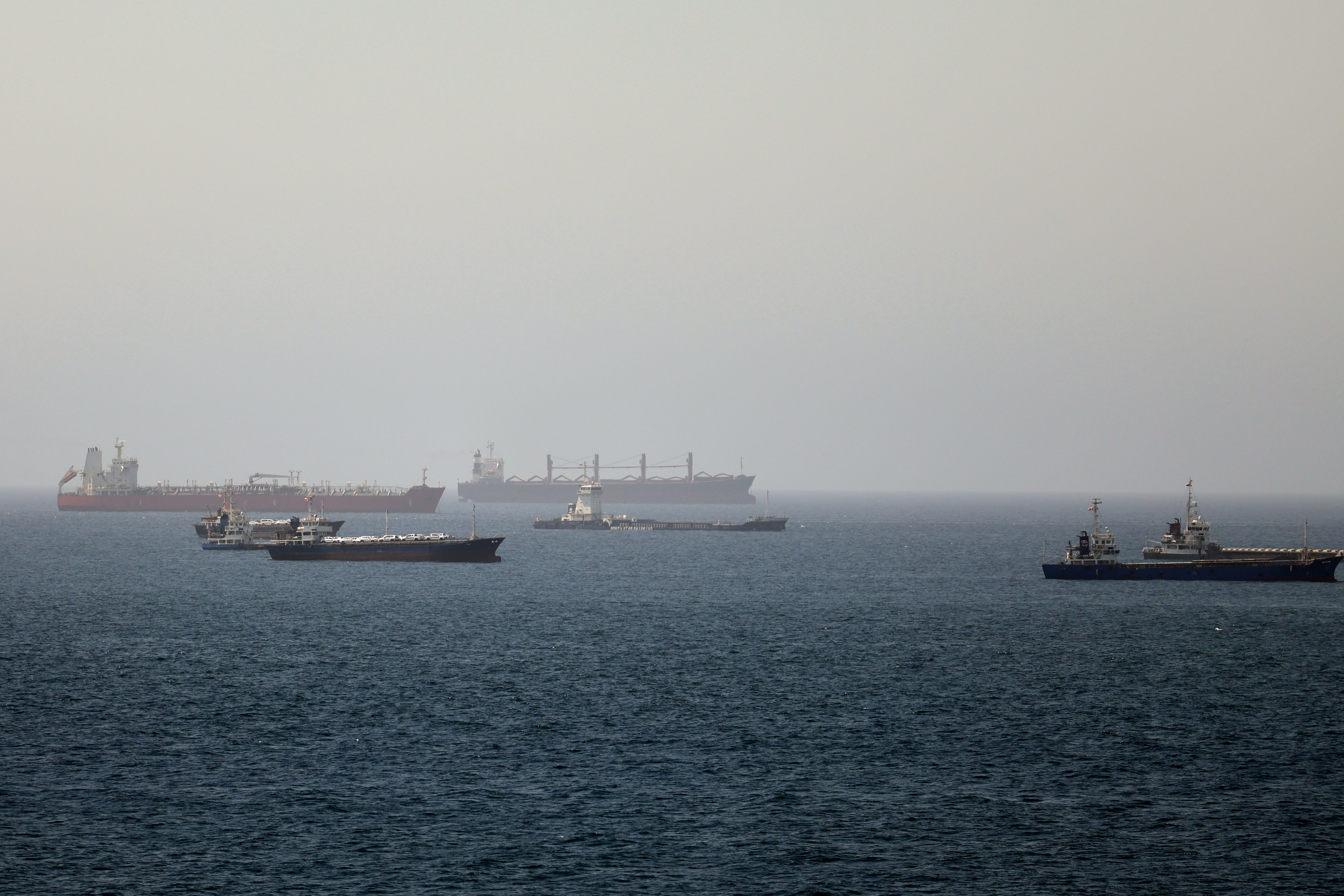 Vessels are seen at sea.