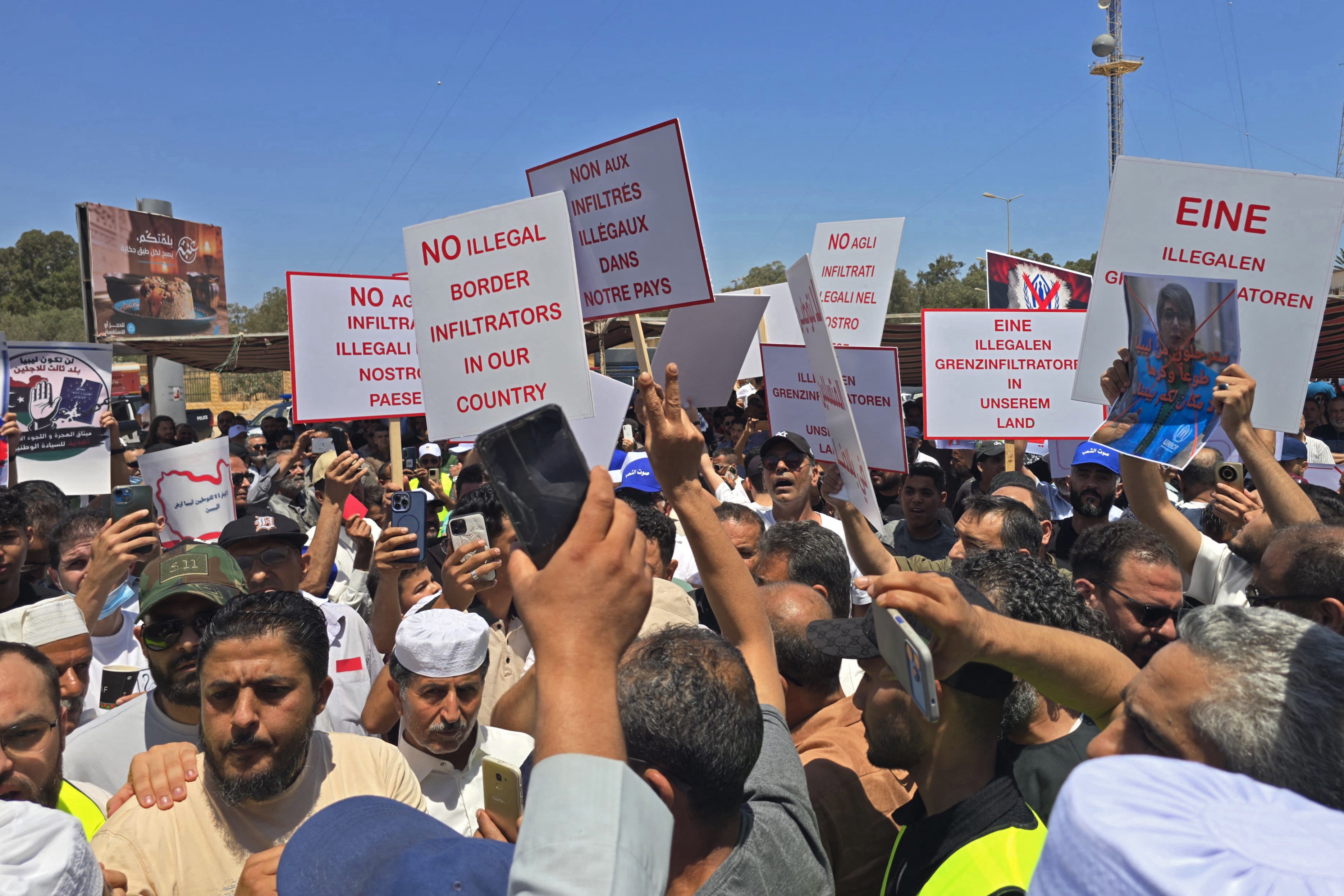 Libyans take part in a demonstration in front of the UNHCR office in Tripoli on June 4, 2026, demanding the departure and closure of the UNHCR offices and declaring 'No to foreign settlement in Libya'.
