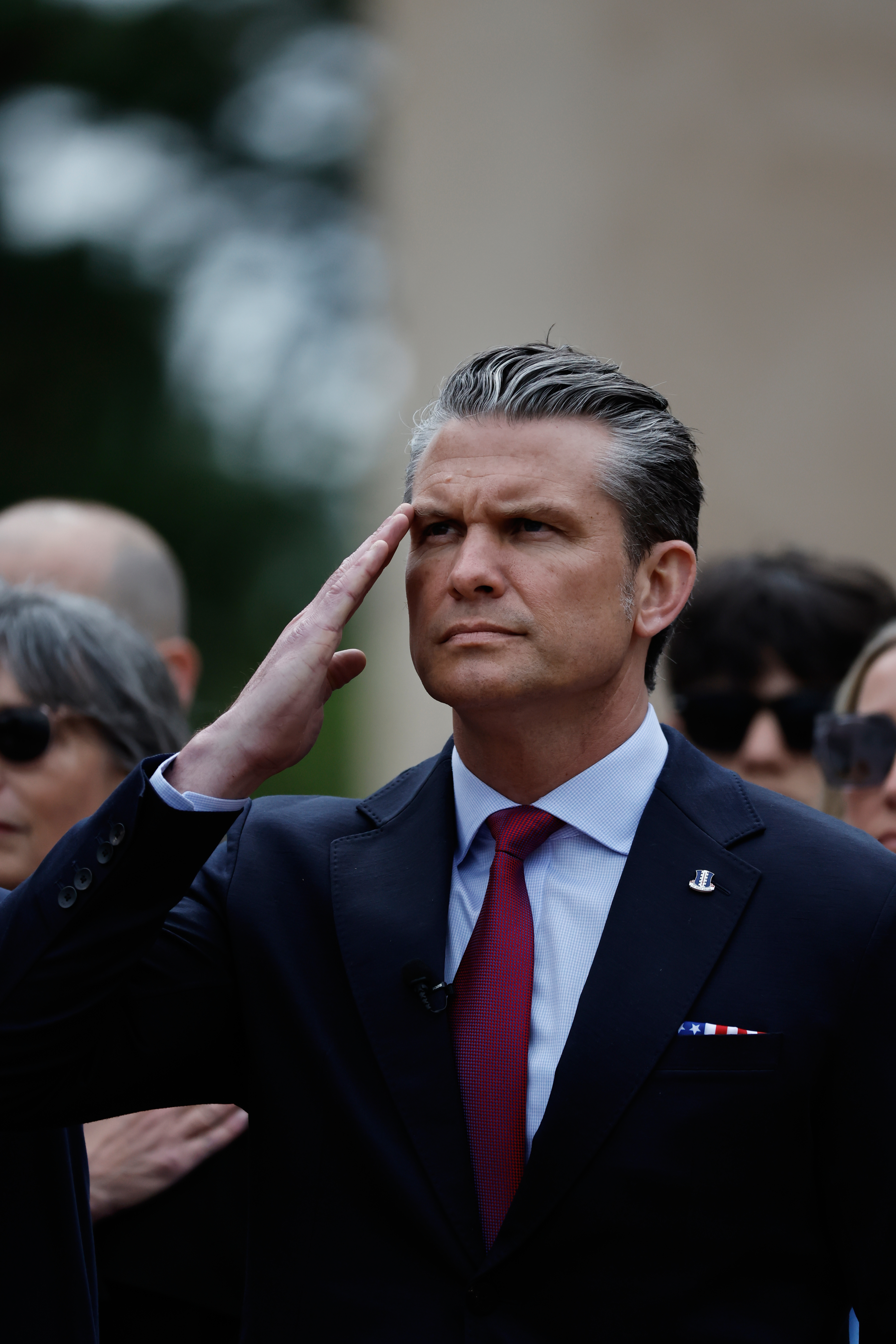 U.S. Defense Secretary Pete Hegseth salutes during a ceremony at the US cemetery to commemorate the 82nd anniversary of the D-Day landings, in Colleville-sur-Mer, Normandy, France, Saturday, June 6, 2026. (AP Photo/Jeremias Gonzalez)