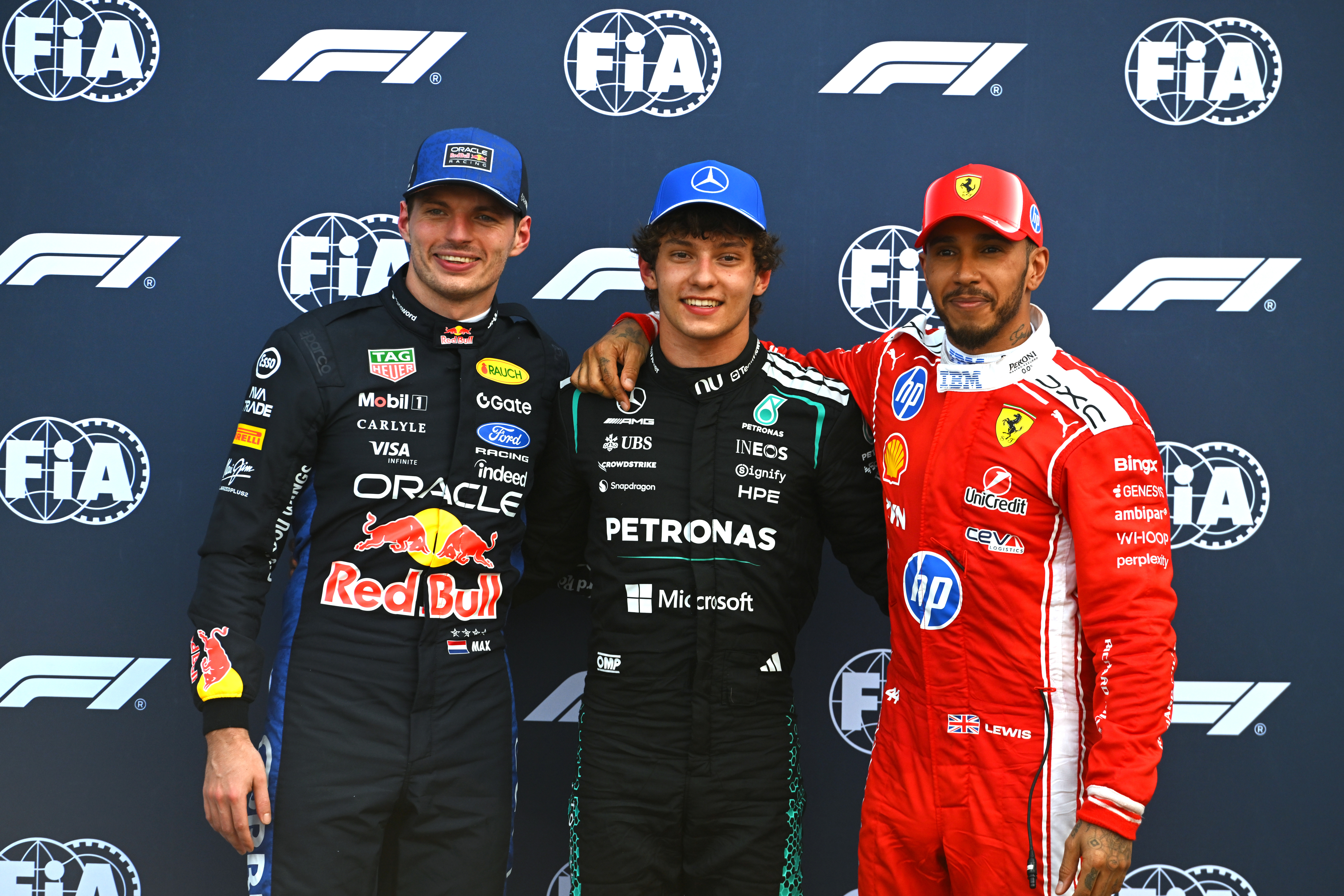 MONTE-CARLO, MONACO - JUNE 06: Pole position qualifier Andrea Kimi Antonelli of Italy and Mercedes AMG Petronas F1 Team Second placed qualifier Max Verstappen of the Netherlands and Oracle Red Bull Racing and Third placed qualifier Lewis Hamilton of Great Britain and Scuderia Ferrari look on during qualifying ahead of the F1 Grand Prix of Monaco at Circuit de Monaco on June 06, 2026 in Monte-Carlo, Monaco. (Photo by Rudy Carezzevoli/Getty Images)
