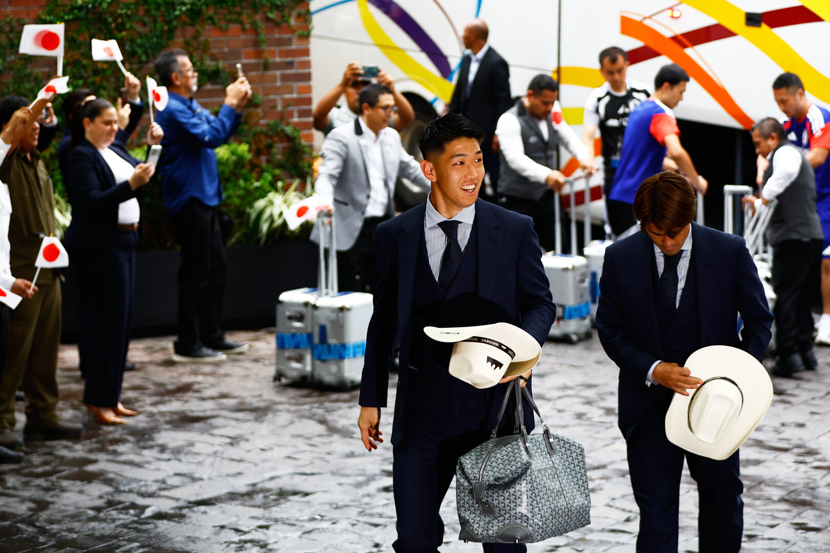 Tomoki Hayakawa, center, of the Japanese national soccer team arrives at their hotel in Monterrey, Mexico, Tuesday, June 2, 2026 [Jorge Mendoza/AP]