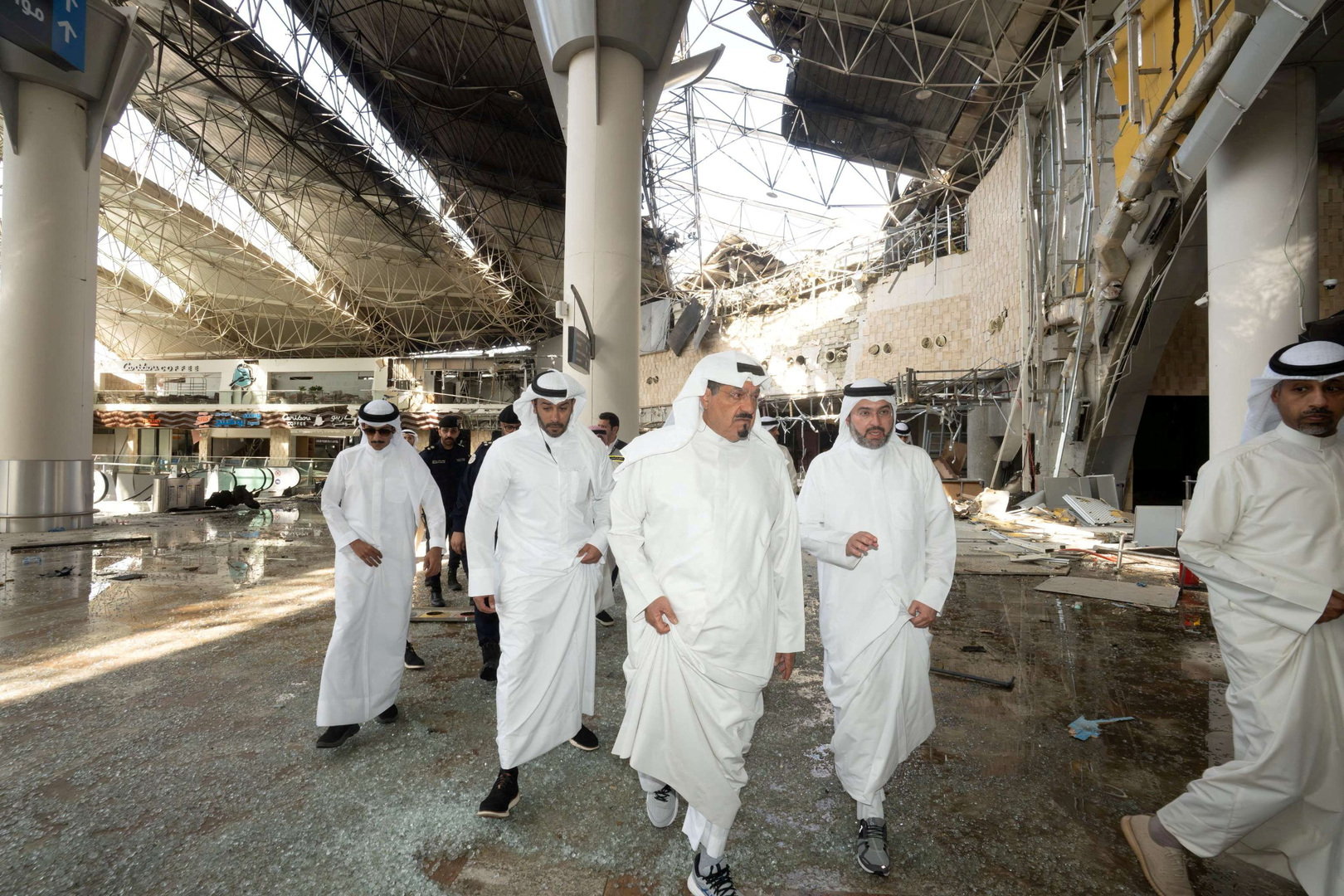 This handout photo provided by the Kuwaiti News Agency on June 3, 2026 shows Kuwaiti Prime Minister Sheikh Ahmad al-Abdullah al-Sabah inspecting the damaged airport after an Iranian attack, in Kuwait City. [Kuwaiti News Agency/AFP]