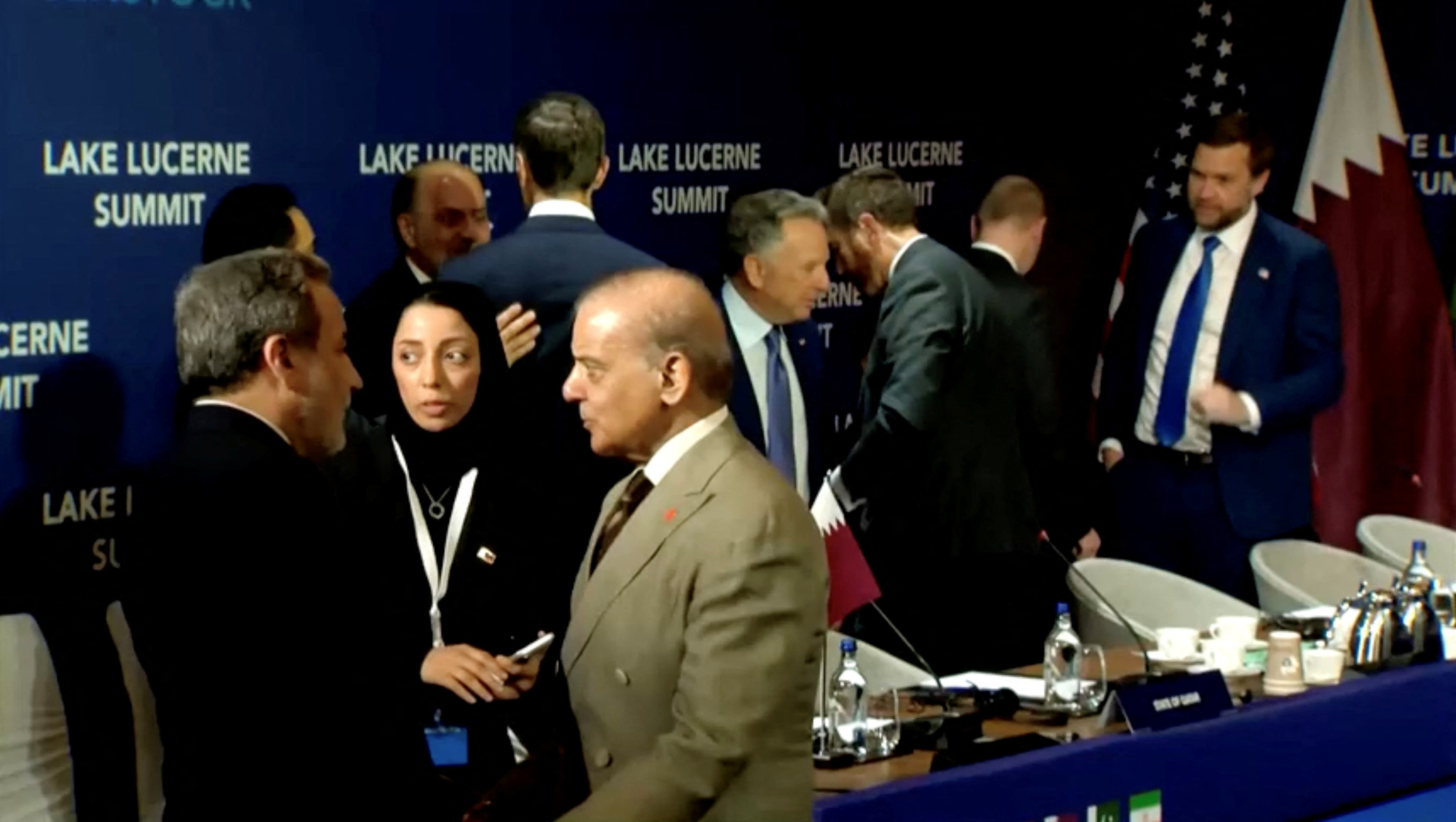 Pakistan's Prime Minister Shehbaz Sharif welcomes Iran's Foreign Minister Abbas Araghchi, as US Vice President JD Vance, President Donald Trump's son-in-law Jared Kushner and Trump's Special Envoy Steve Witkoff stand in the background.