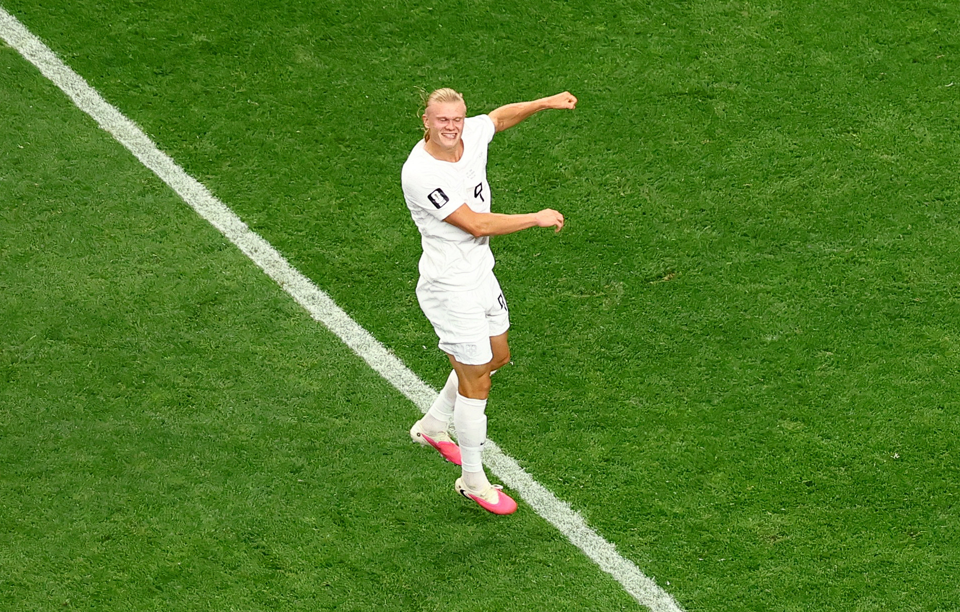Erling Haaland celebrates after the match as Norway qualify for the round of 16