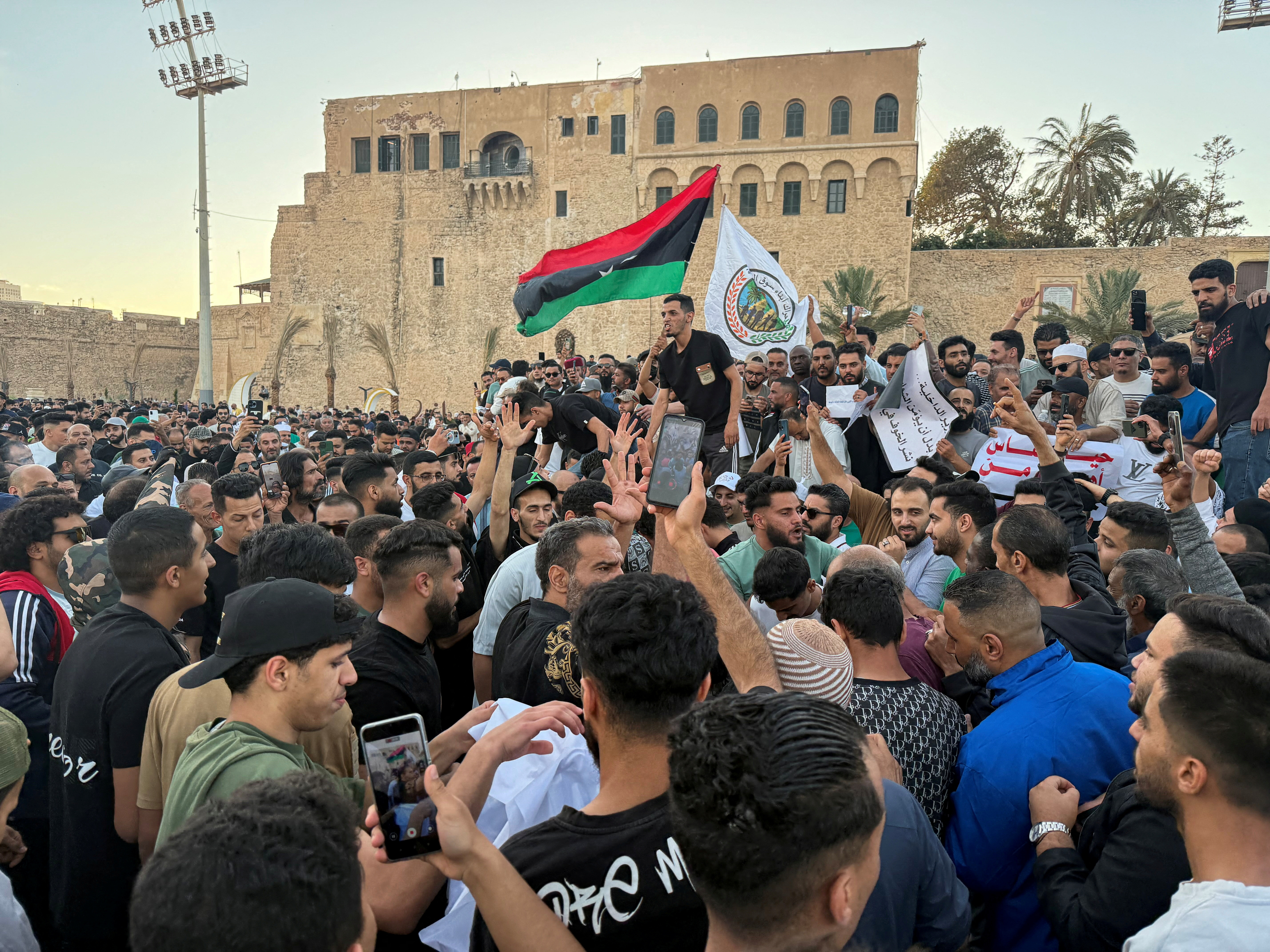 A crowd of many people on a street