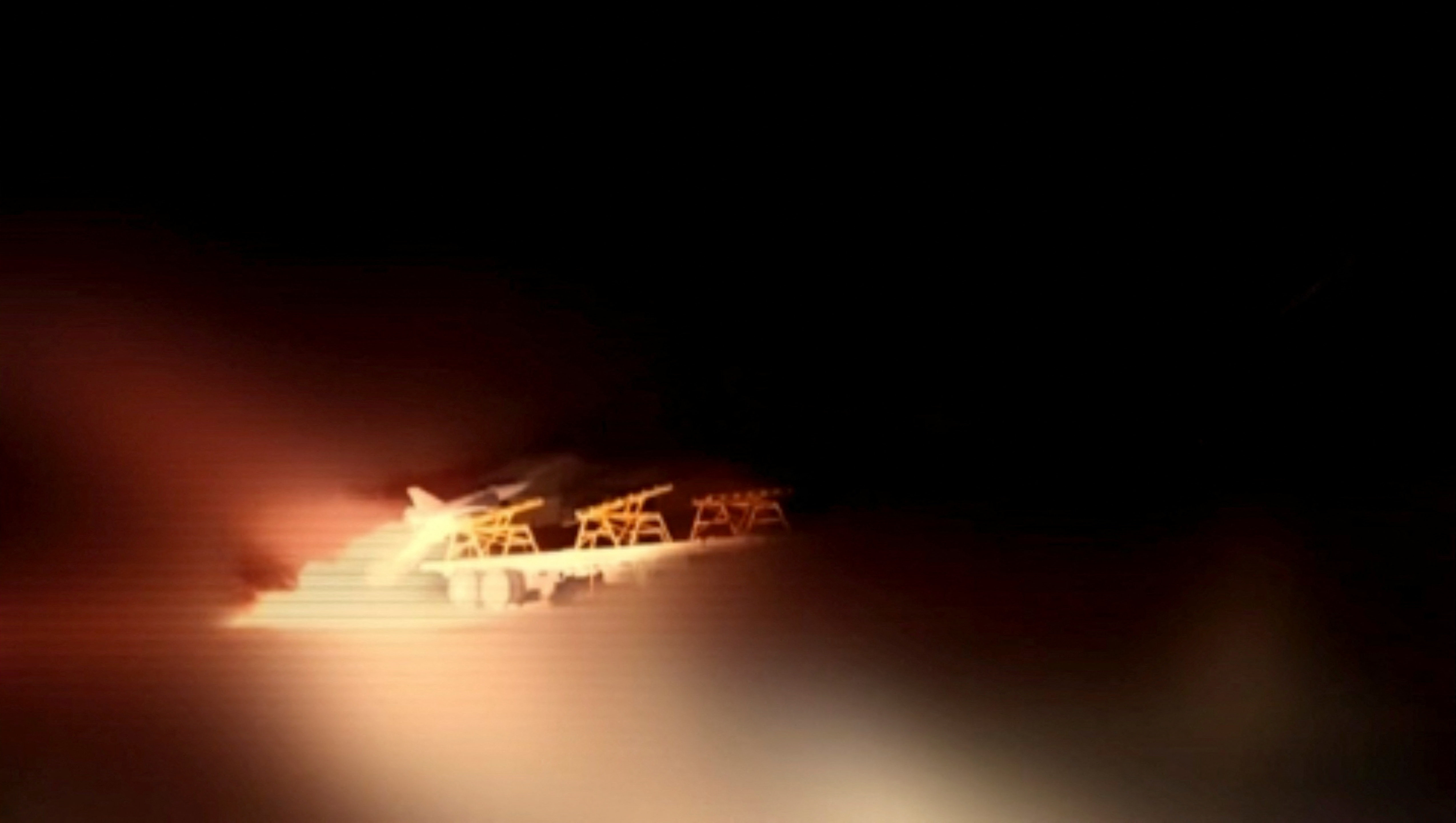 A still image from handout video released July 14, 2026 said to show a drone being launched by Iran from an unknown location to attack U.S. positions at Azraq base in Jordan.