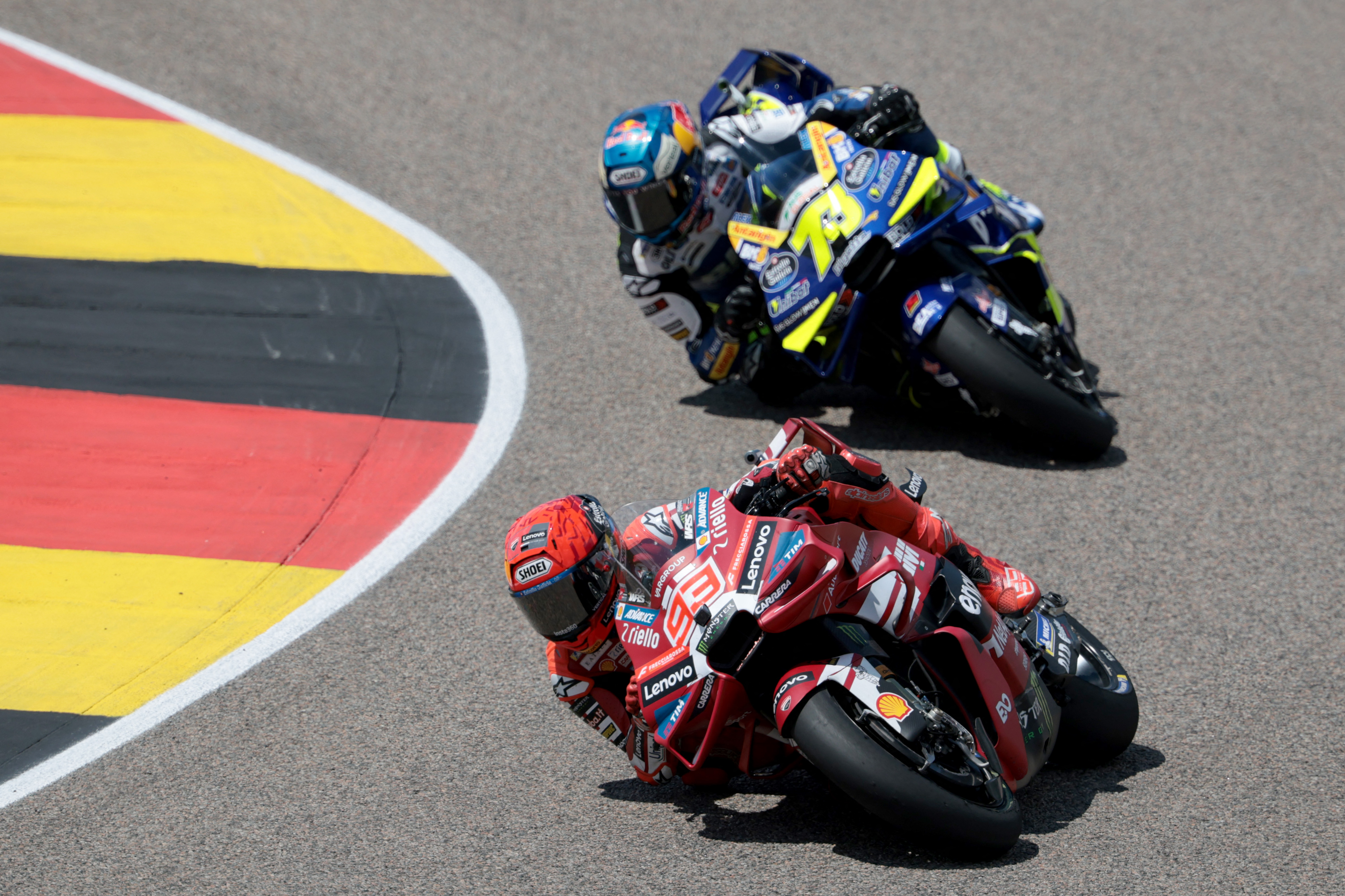 Marc Marquez, front, leads his brother Alex Marquez during the German MotoGP