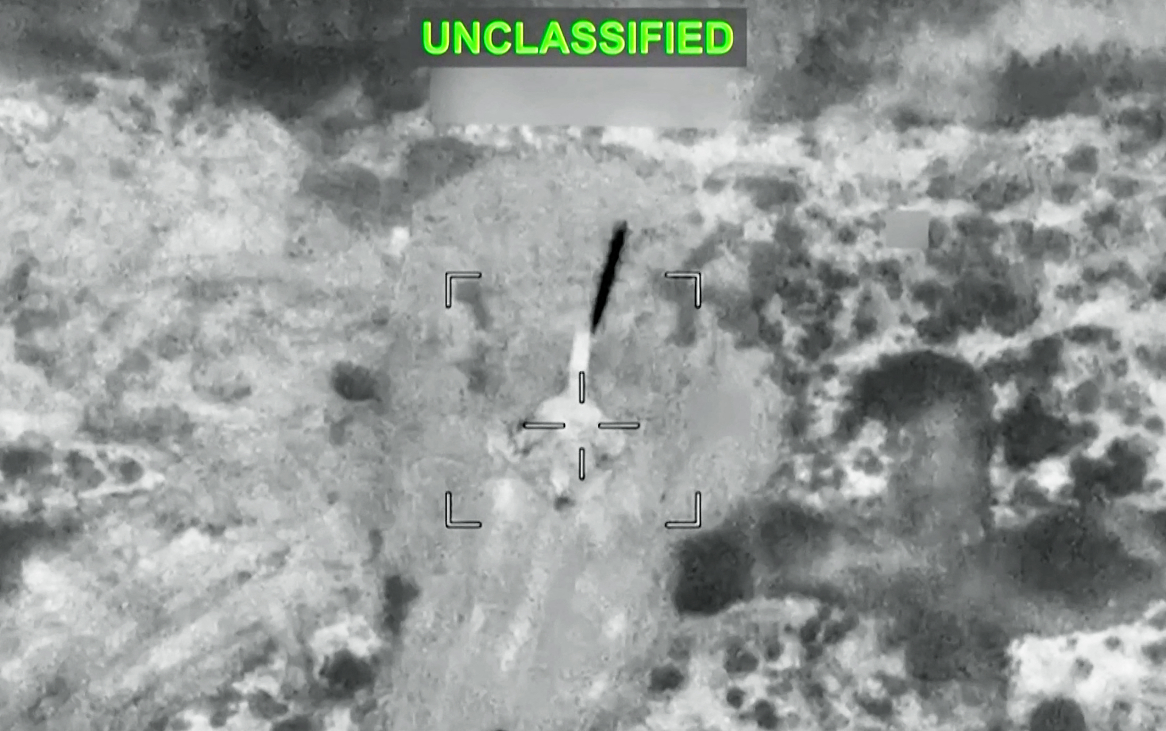 This screen grab taken from video footage shared by the US Central Command on social media platform X and made available via AFPTV on July 13, 2026 purportedly shows US strikes against Iranian military installations. The United States struck Iran on July 13 for a second day running, drawing Tehran's reprisals against US allies in the Gulf as the foes battle over the status of the strategic Strait of Hormuz. (Photo by AFPTV / AFP) / - Israel OUT / Israel OUT / NO Access Israel Media/Persian Language TV Stations Outside Iran / Strictly No Access BBC Persian / VOA Persian/Manoto TV / Iran International / / Radio Farda -- / Attention editors: AFP covers the war in the Middle East through its extensive regional network, including bureaus in Tehran, Jerusalem, and several neighboring countries. Since the start of the conflict, journalists have been working under increasingly restrictive conditions. Authorities in several countries have limited reporters' movements, photo and live video coverage from sensitive locations. Some governments and armed groups have banned images of missile or drone strikes and other security-related sites.