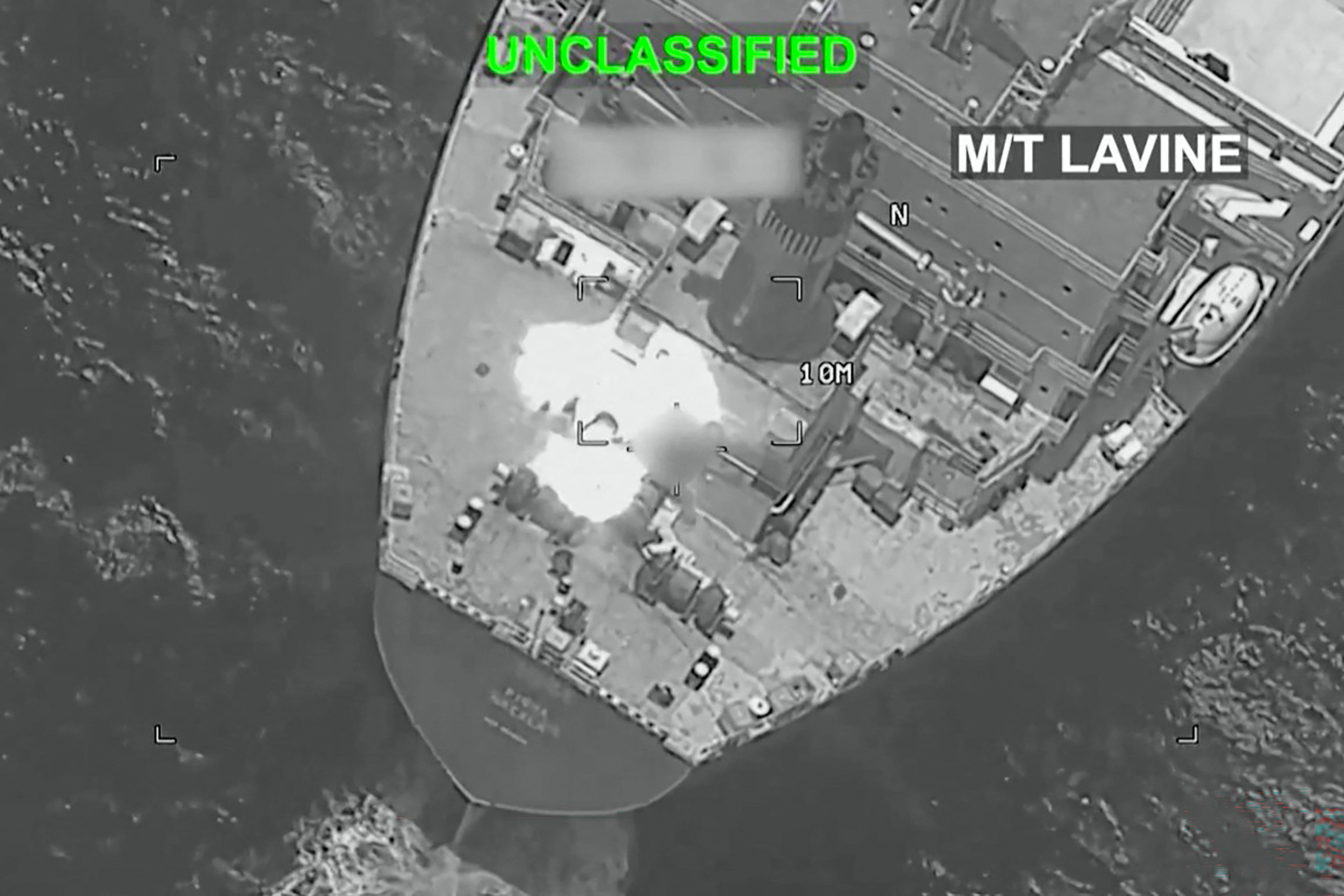 This screen grab made on July 26, 2026 from undated handout video footage released by the US Central Command (CENTCOM) on July 25, 2026 shows what CENTCOM says are operations enforcing its naval blockade against Iran. Iran passed another night without US airstrikes on July 26, as Washington paused a war nearing its fifth month and reports emerged that concerns over dwindling munitions were restraining plans for further escalation. (Photo by US Central Command (CENTCOM) / AFP) / THIS PICTURE WAS BLURRED AT SOURCE --- RESTRICTED TO EDITORIAL USE - MANDATORY CREDIT "AFP PHOTO / US CENTRAL COMMAND (CENTCOM)" - HANDOUT - NO MARKETING NO ADVERTISING CAMPAIGNS - DISTRIBUTED AS A SERVICE TO CLIENTS