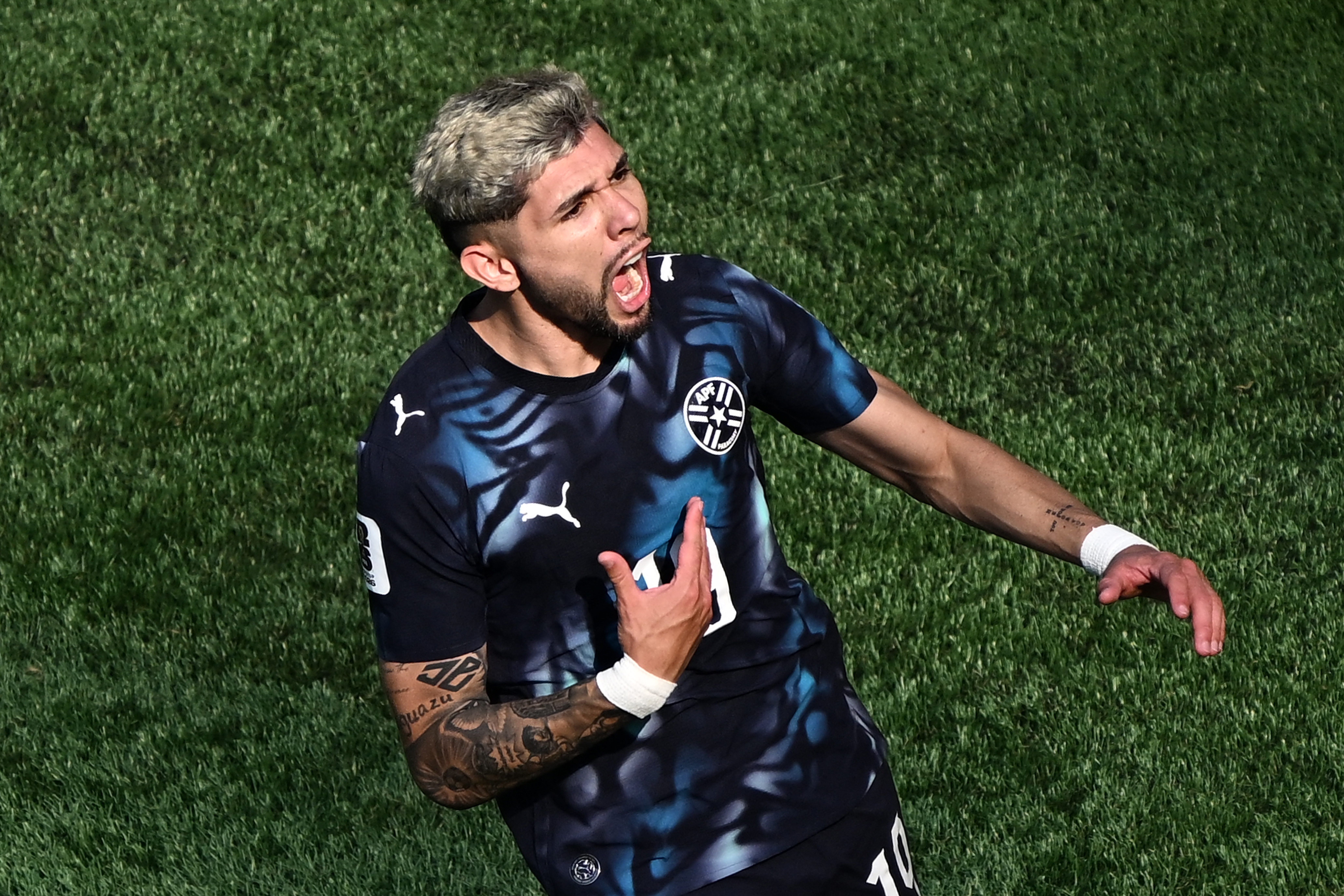 Paraguay's midfielder #19 Julio Enciso celebrates scoring his team's first goal during the 2026 World Cup round of 32 football match between Germany and Paraguay at the Boston Stadium in Foxborough on June 29, 2026.