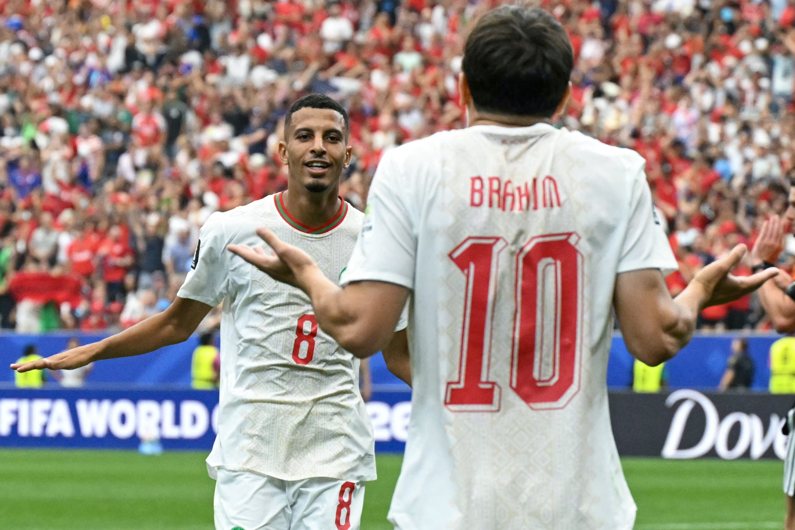 Morocco’s midfielder #08 Azzedine Ounahi celebrates scoring his team’s second goal with teammate forward #10 Brahim Diaz during the 2026 World Cup round of 16 football match between Canada and Morocco, at the Houston Stadium in Houston on July 4, 2026 [AFP]