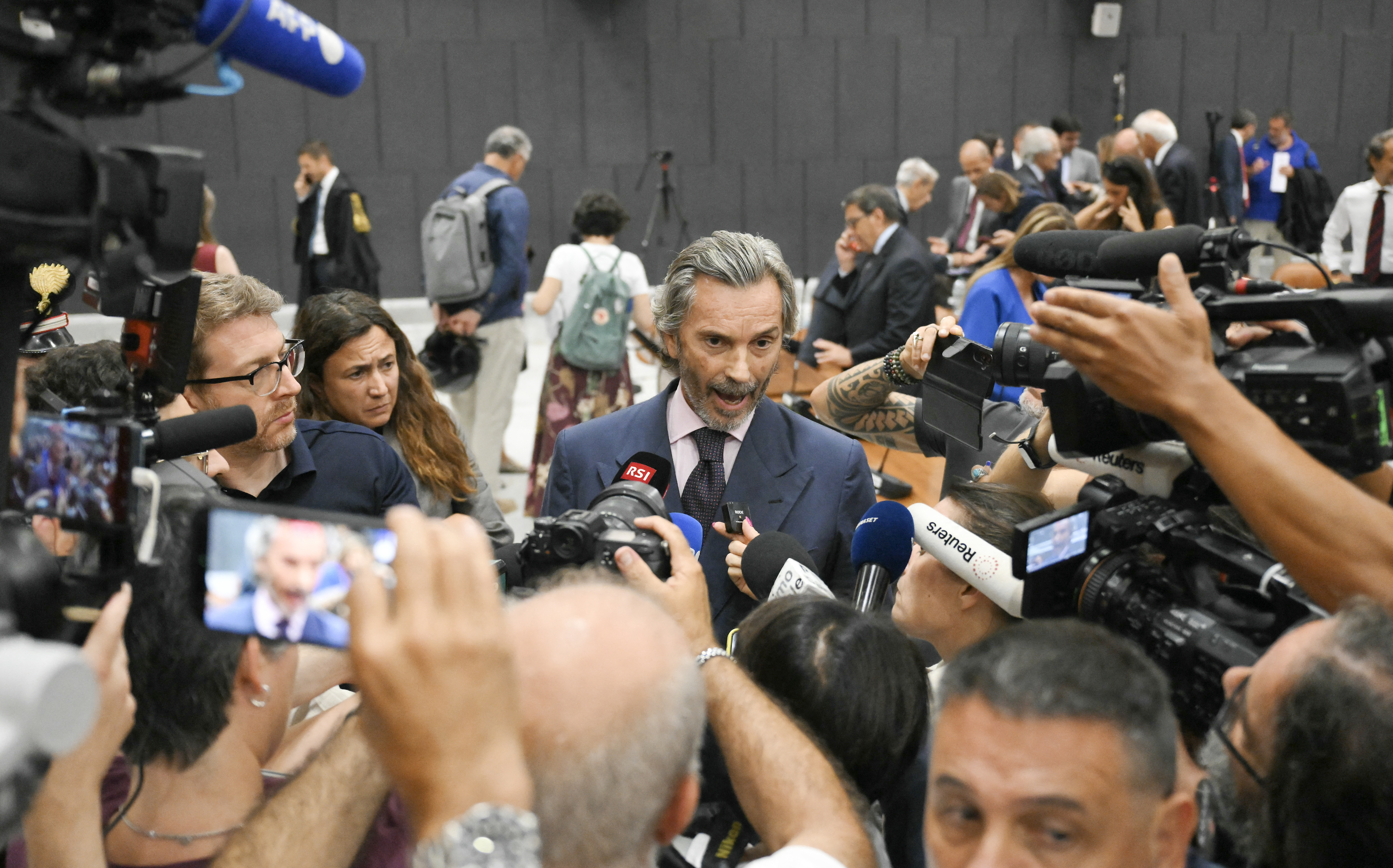 Giovanni Paolo Accini, Lawyer of former CEO of Atlantia Giovanni Castellucci, speaks with media in the Courthouse after the verdict in the case of the Morandi Bridge collapse nearly eight years ago that killed 43 people in one of the country’s worst infrastructure disasters, in Genoa on July 16, 2026 [AFP]