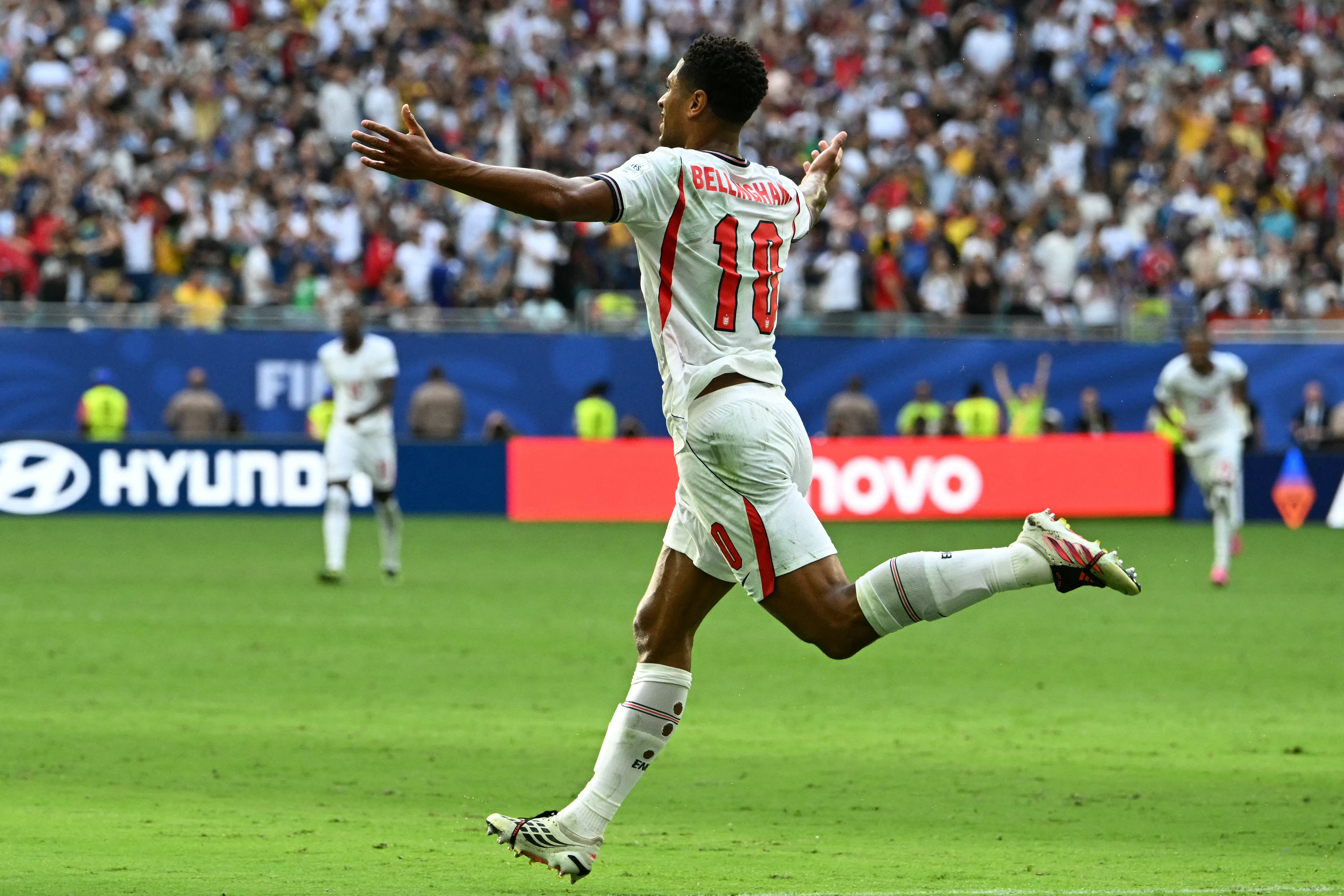 England's midfielder #10 Jude Bellingham celebrates scoring his team's sixth goal during the 2026 World Cup football tournament third-place match between France and England at the Miami Stadium in Miami on July 18, 2026.