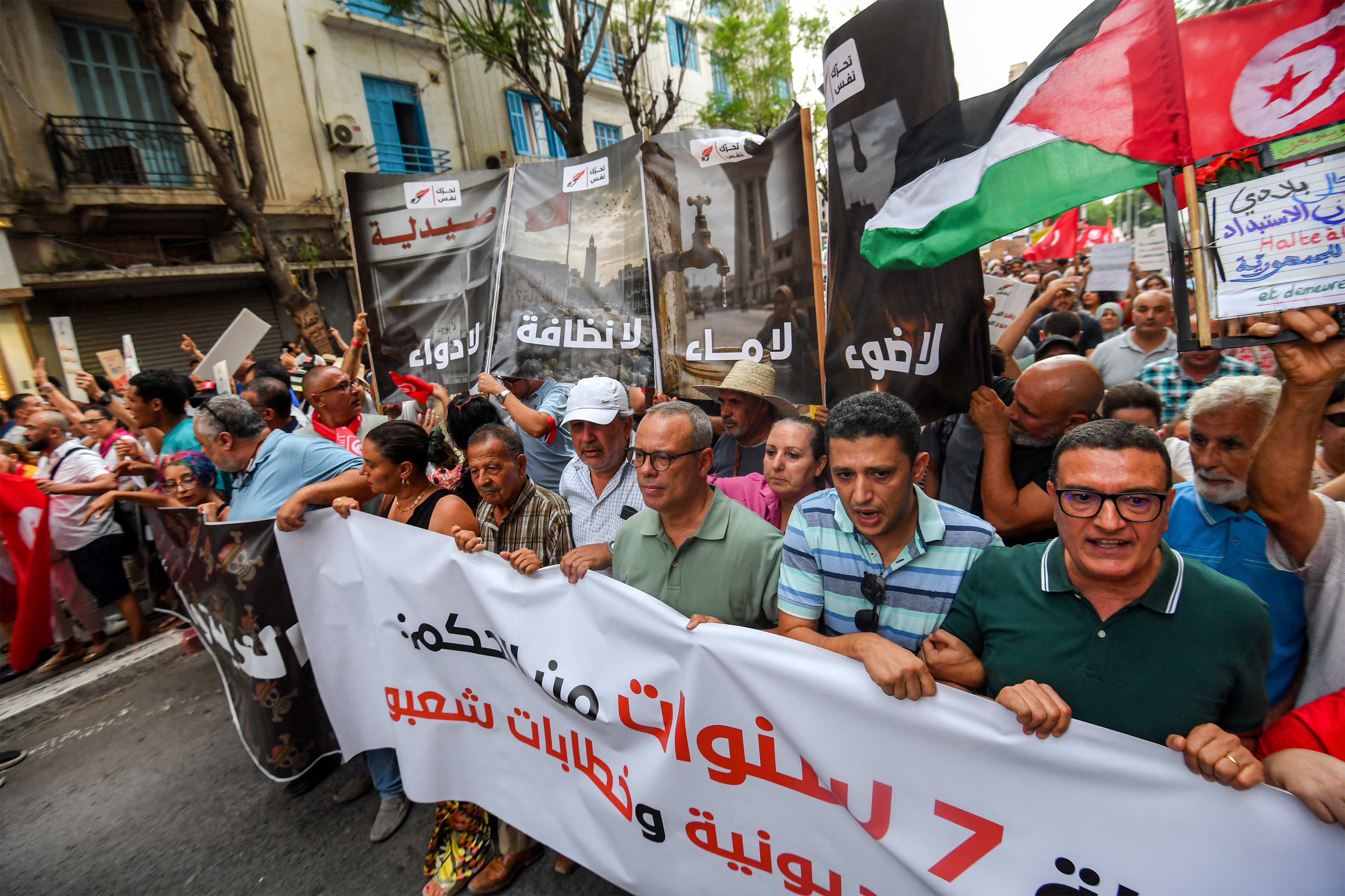People gather to protest Tunisia’s President Kais Saied during a demonstration marking five years since his suspension of parliament and assumption of emergency powers, in Tunis on July 25, 2026 [AFP]