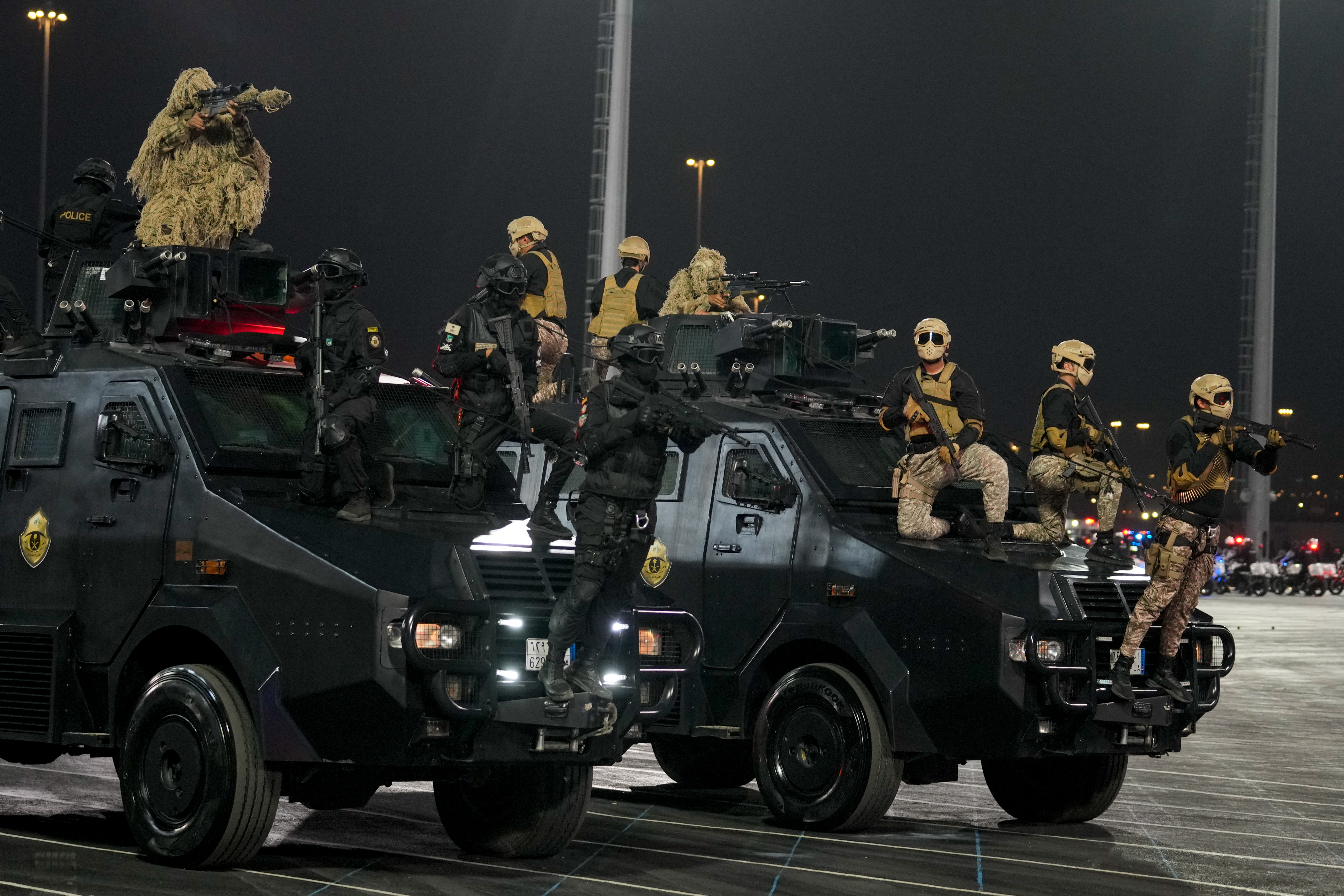 Members of the Saudi special forces perform during a military parade in preparation for the annual Hajj pilgrimage, in the Muslim holy city of Mecca, Saudi Arabia, Thursday, May 21, 2026. (AP Photo/Altaf Qadri)