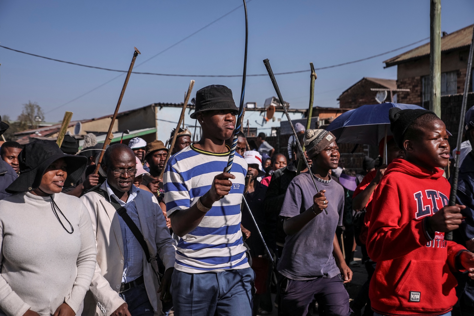 Protesters chant slogans during an anti immigrant march in Alexandra, on July 9, 2026. [MZINGENKOSI SIBANDA/AFP]