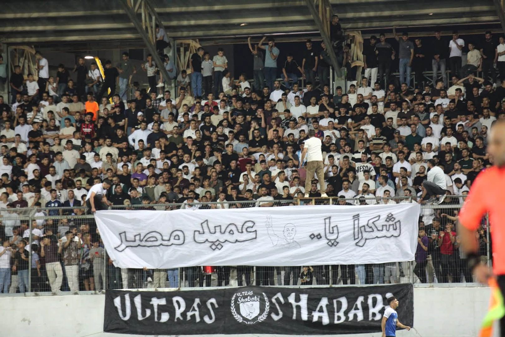 Fans of Palestinian club Shabab Al-Khaleel raised a banner thanking Egypt coach Hossam Hassan