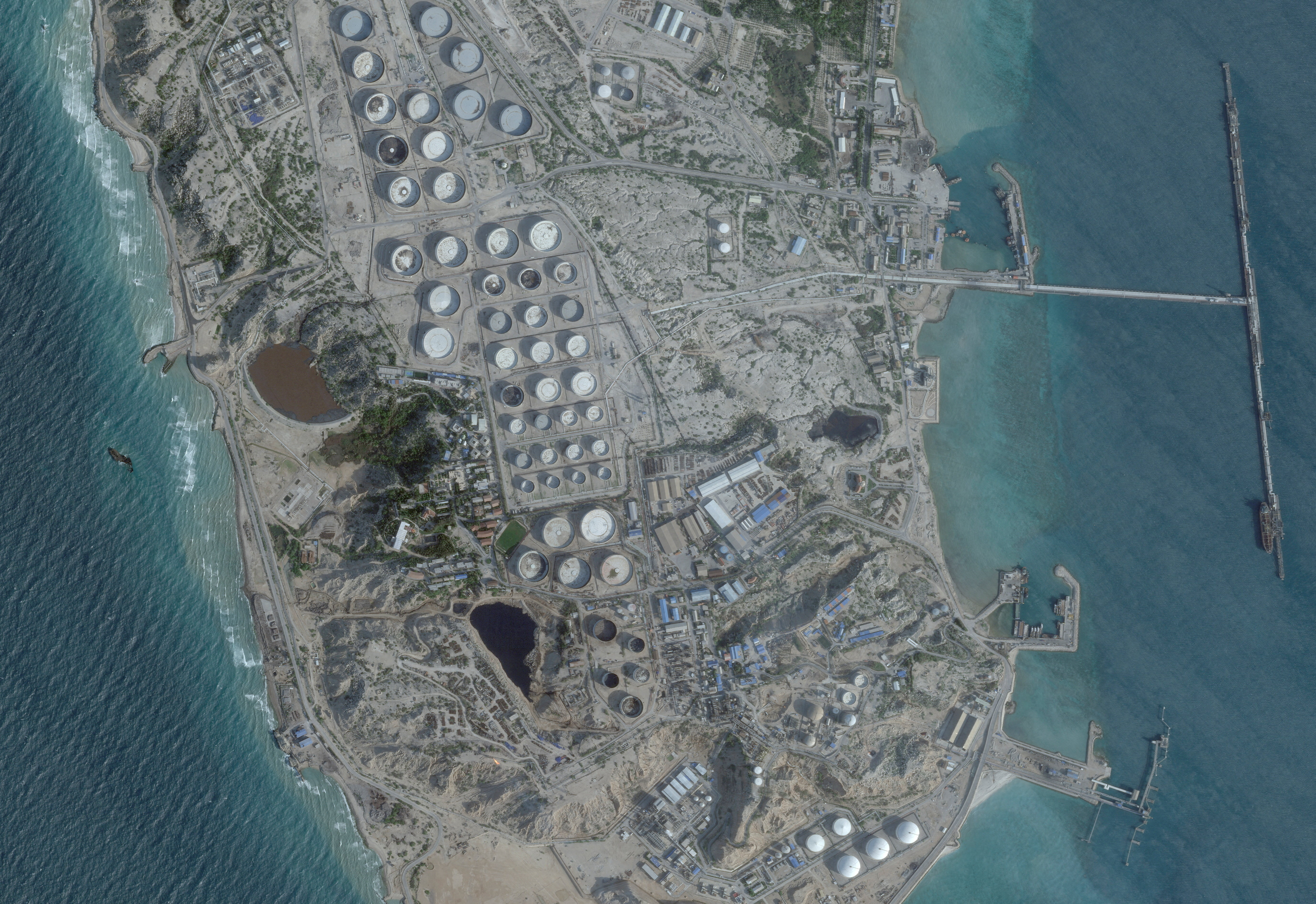 FILE PHOTO: A satellite image shows an oil terminal at Kharg Island, Iran, February 25, 2026. 2026 Planet Labs PBC/Handout via REUTERS THIS IMAGE HAS BEEN SUPPLIED BY A THIRD PARTY. MANDATORY CREDIT/File Photo