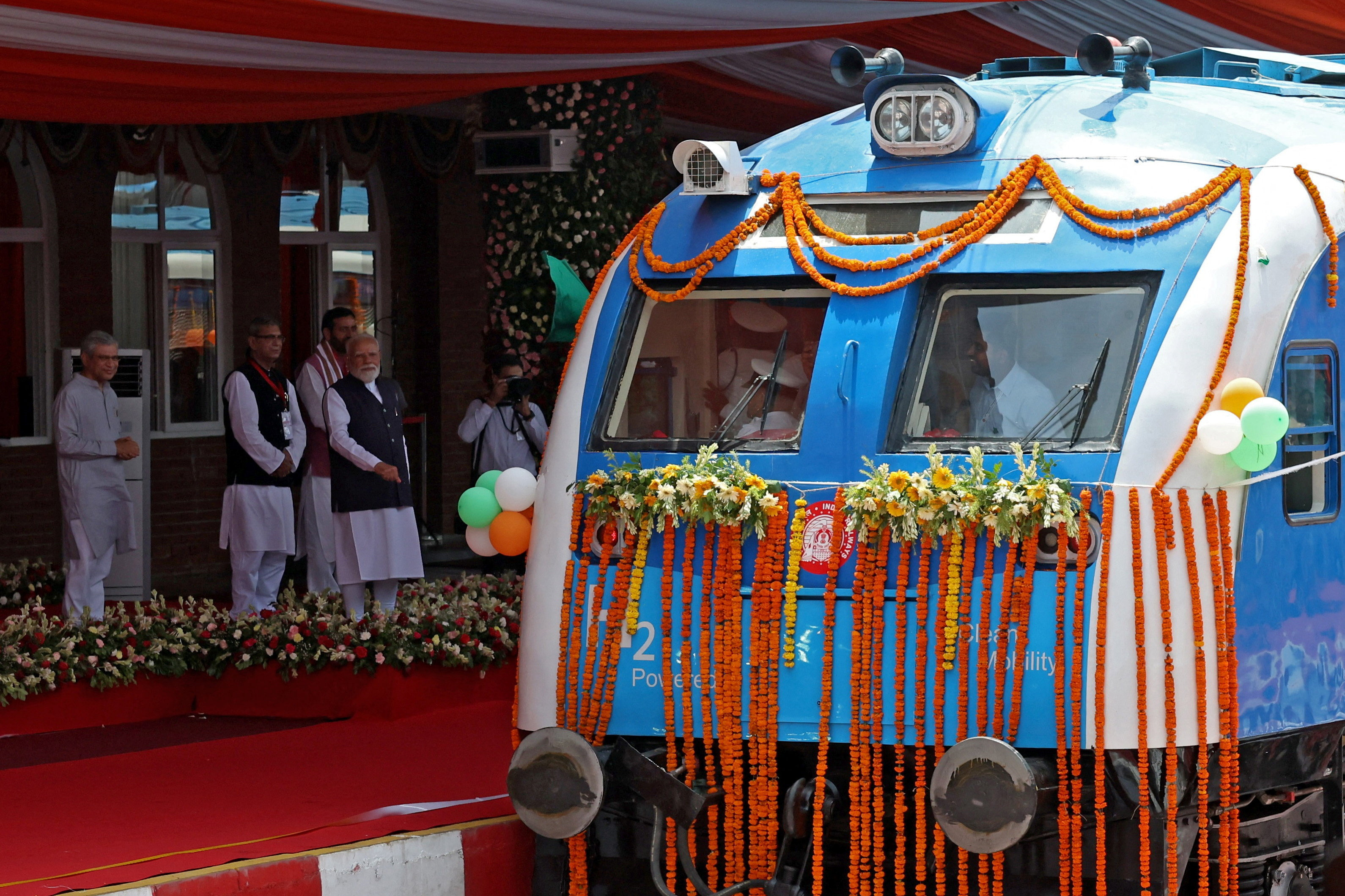 India's Prime Minister Narendra Modi flags off Namo Green Rail, India's first hydrogen-powered train along with Railways Minister Ashwini Vaishnaw, and Chief Minister of Haryana Nayab Singh Saini, in Jind, Haryana, India, July 17, 2026. REUTERS/Bhawika Chhabra