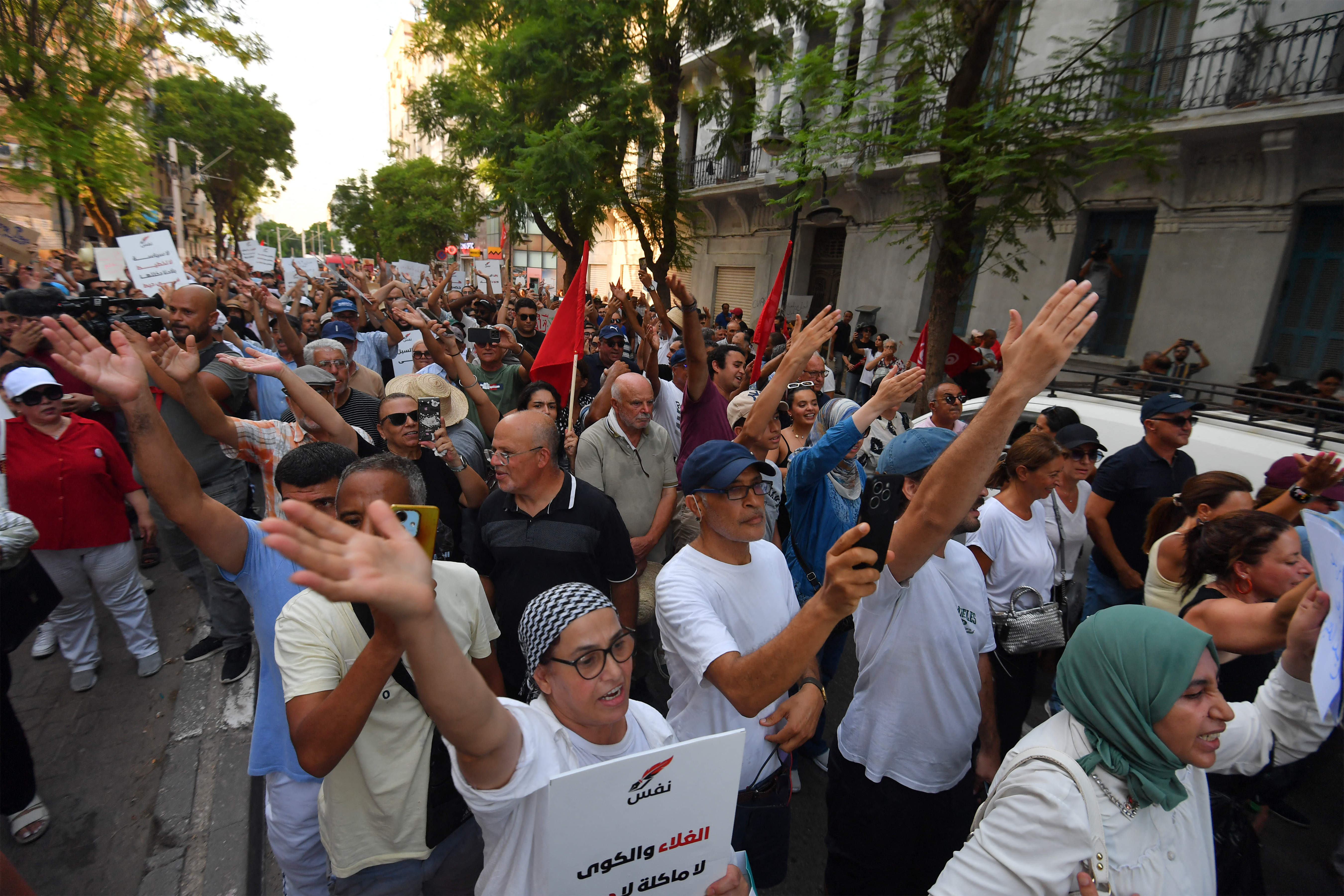 Demonstrators march in Tunis during a protest against Tunisian President Kais Saied on August 20, 2026 [AFP]