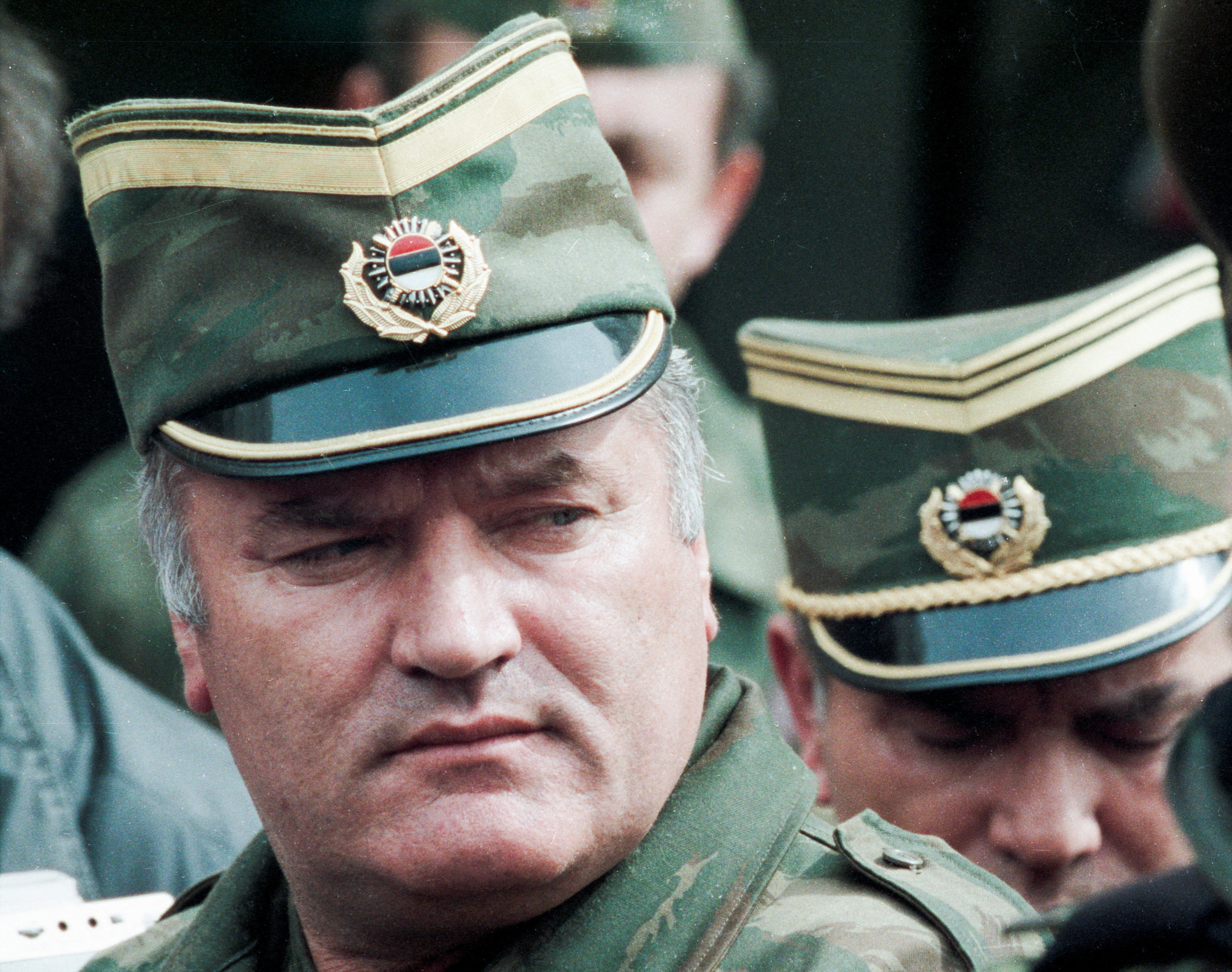 FILE PHOTO: Bosnian Serb General Ratko Mladic leaves a meeting at the airport in Sarajevo, Bosnia and Herzegovina April 13, 1993. Picture taken April 13, 1993. REUTERS/Chris Helgren/File Photo