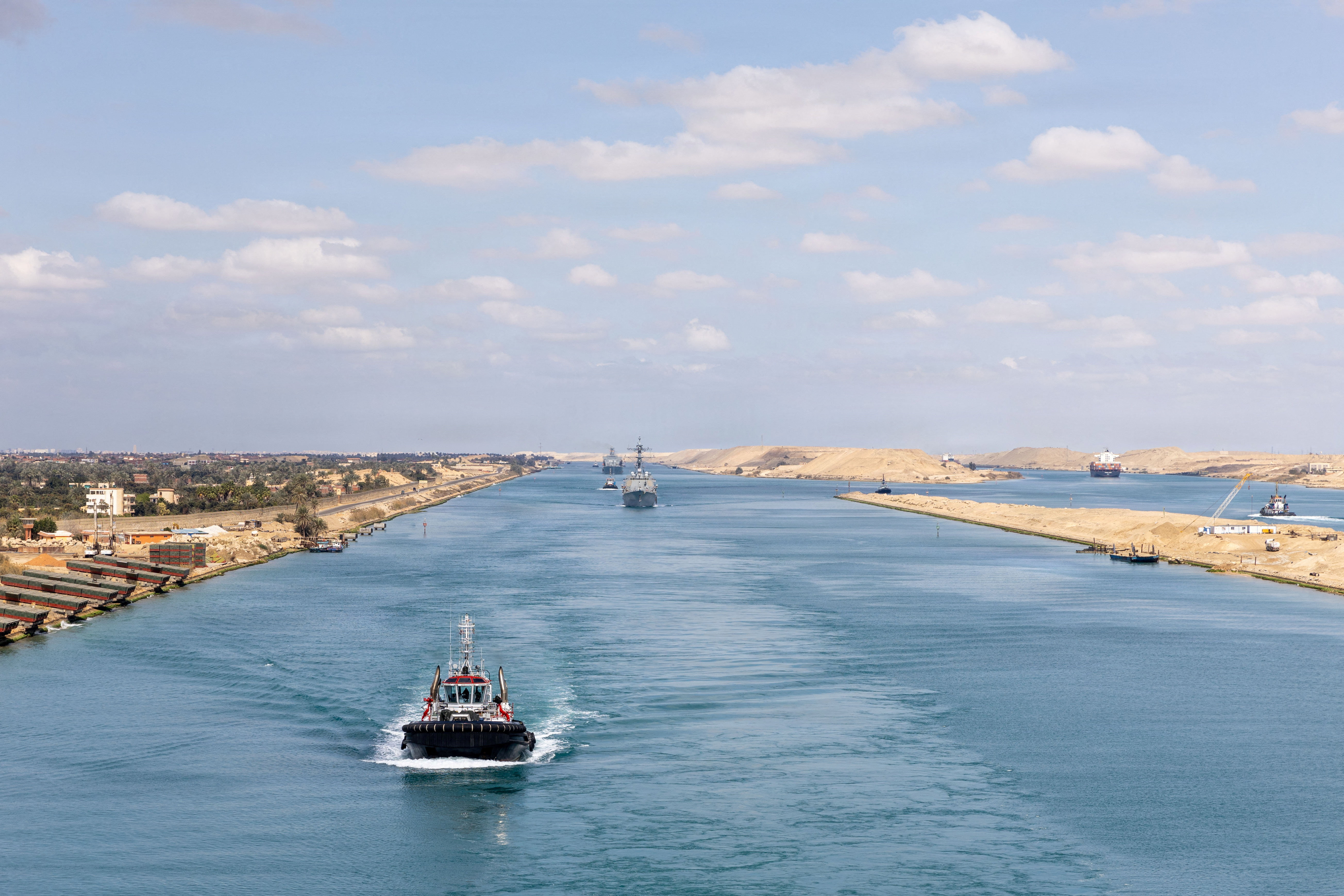 A United States Navy guided missile destroyer in the Suez Canal, en route to support the Operation Epic Fury attack on Iran, in Egypt, on March 5, 2026 [Reuters]