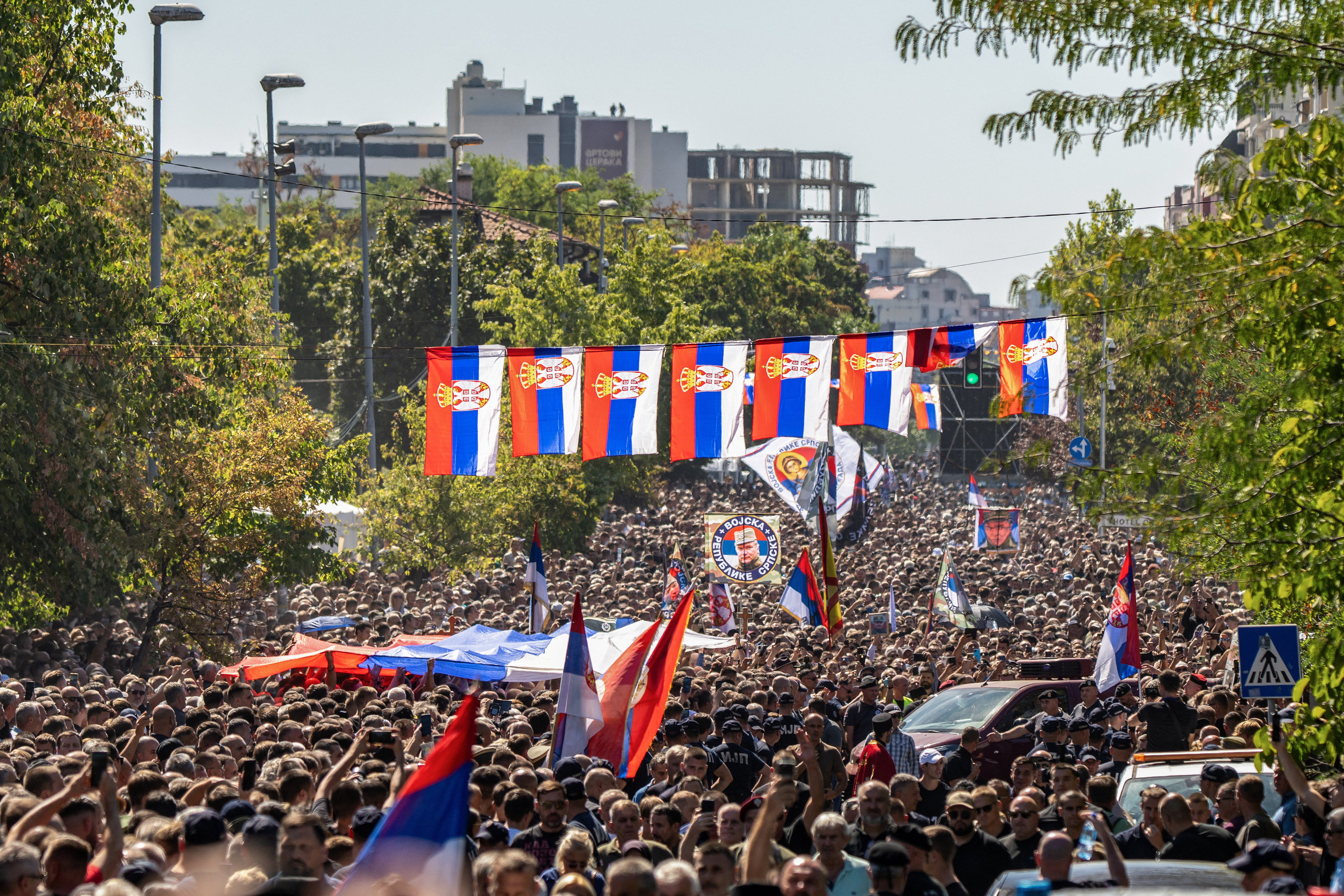 People attend a funeral of former Bosnian Serb wartime general Ratko Mladic at the Topcider Cemetery in Belgrade, Serbia, September 7, 2026. REUTERS/Uros Arsic