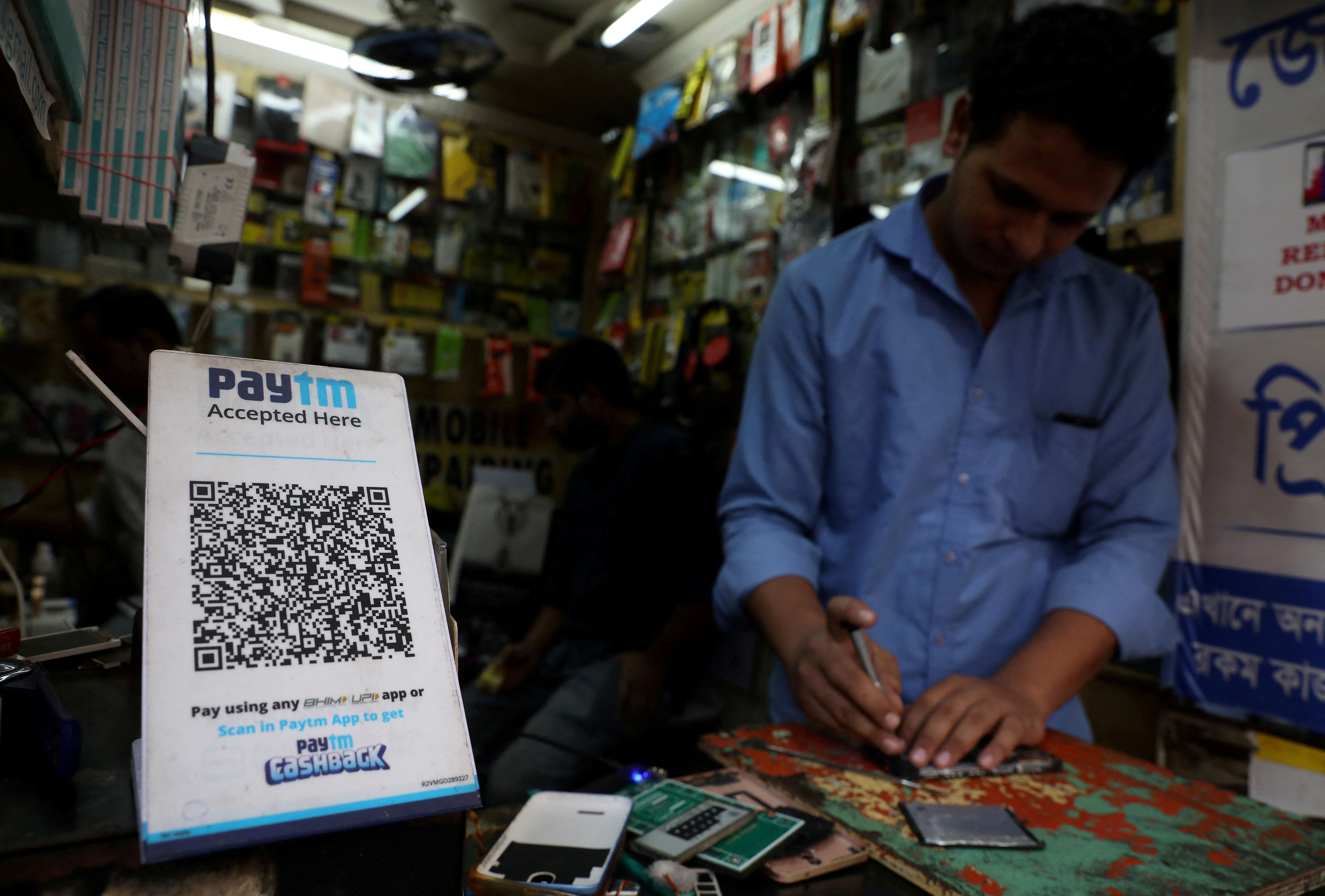 A QR code for payment at a mobile repairing shop in Kolkata, November 9, 2021