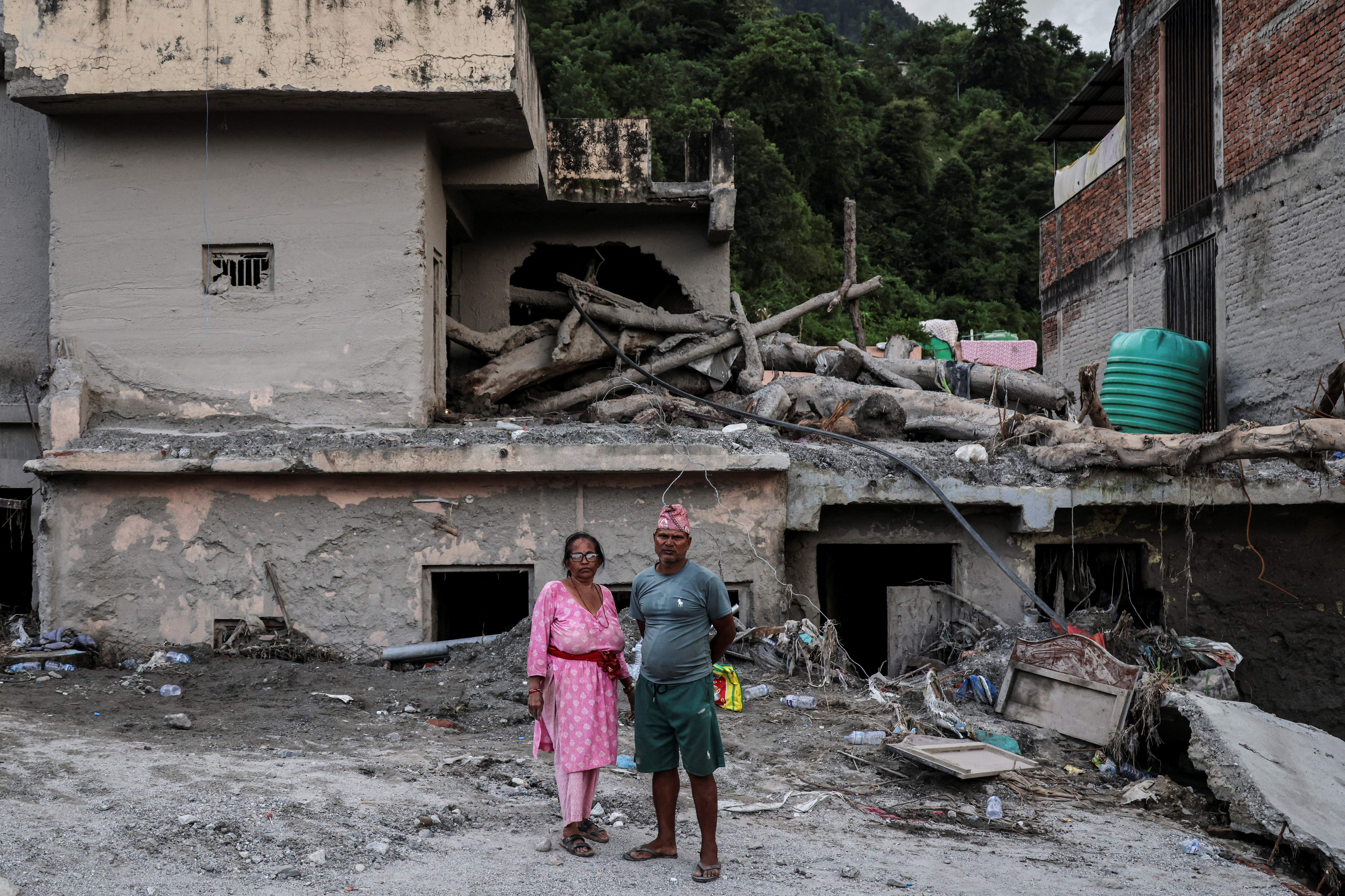 Nepal flood survivors find little trace of former lives