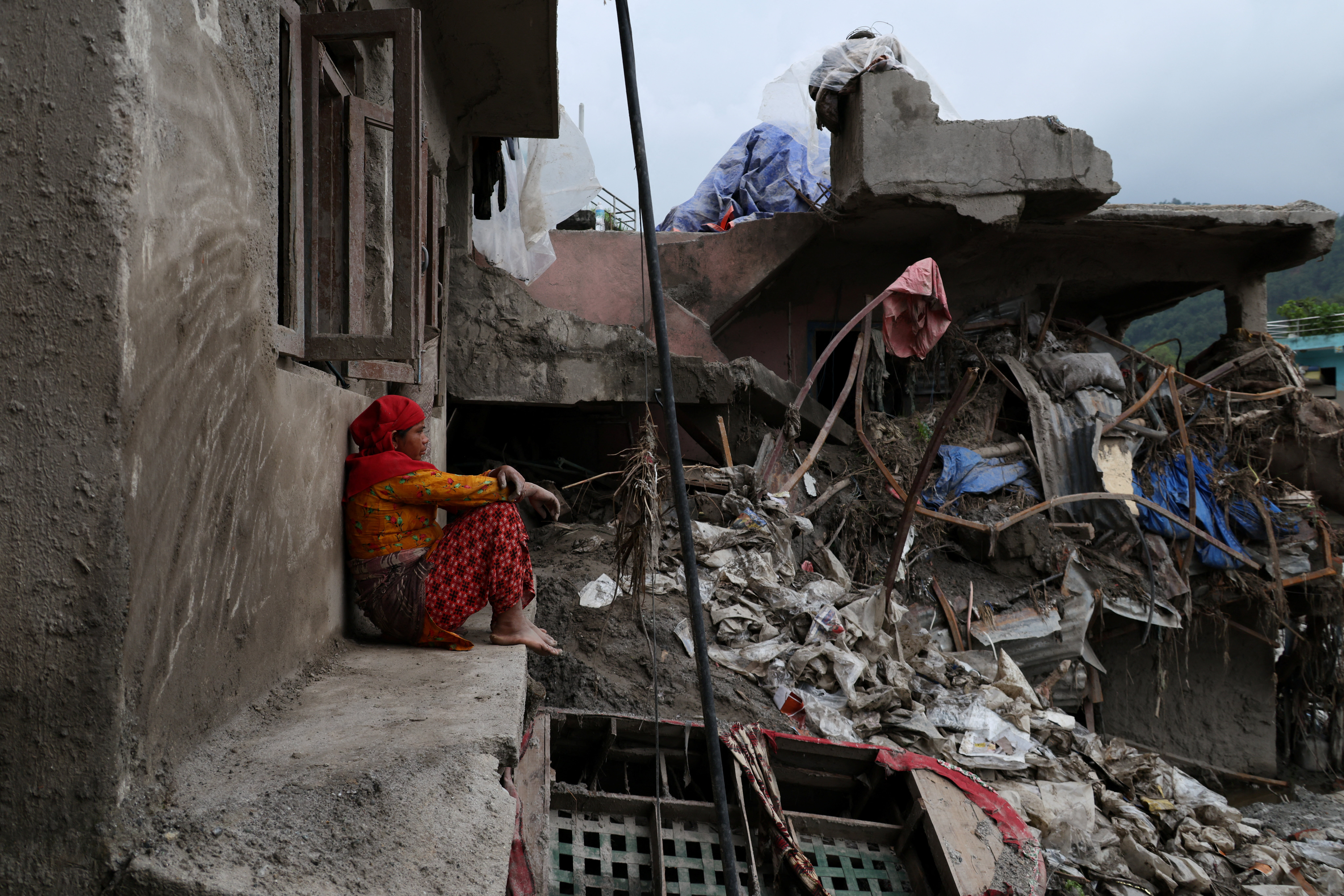 Nepal flood survivors find little trace of former lives
