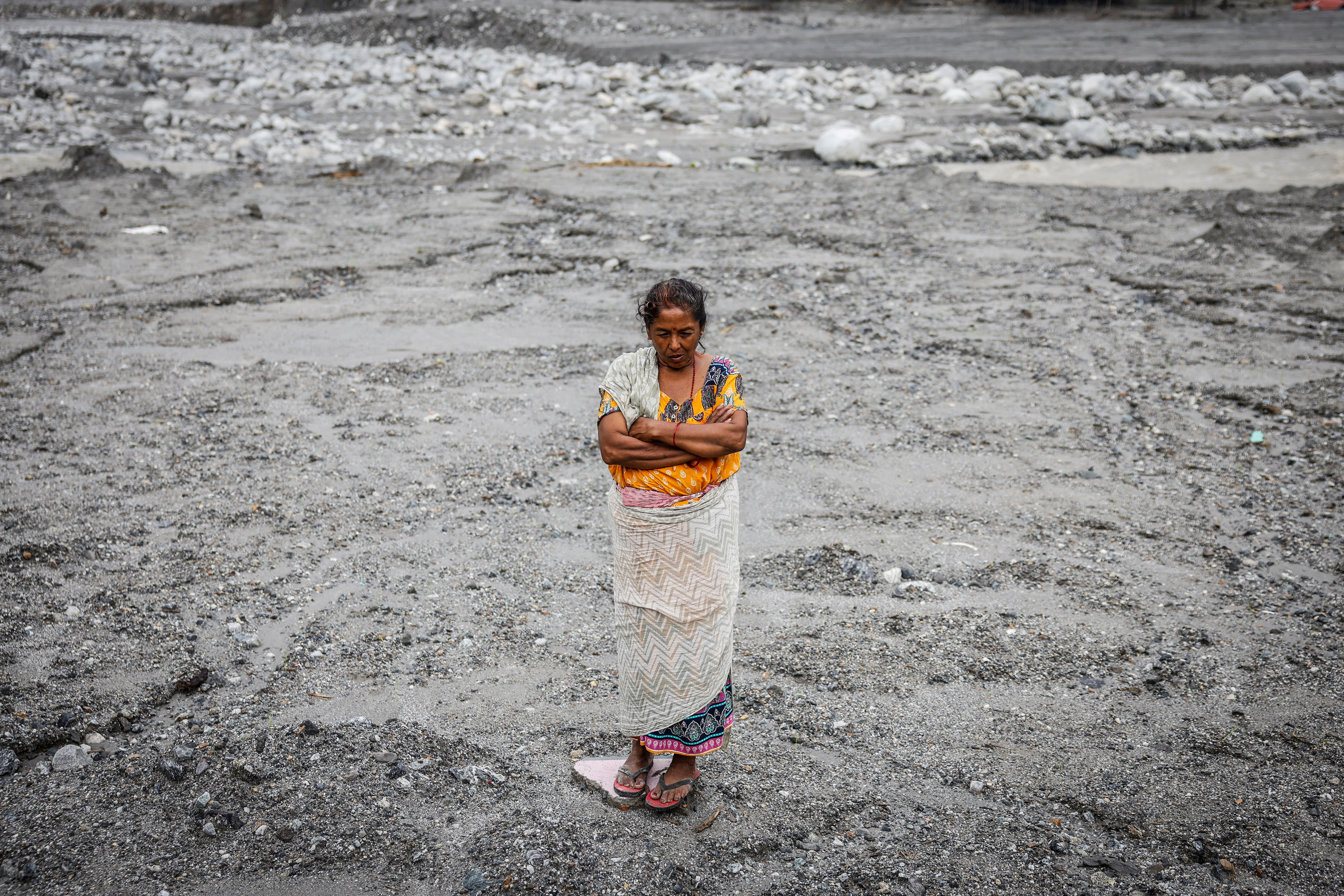 Nepal flood survivors find little trace of former lives
