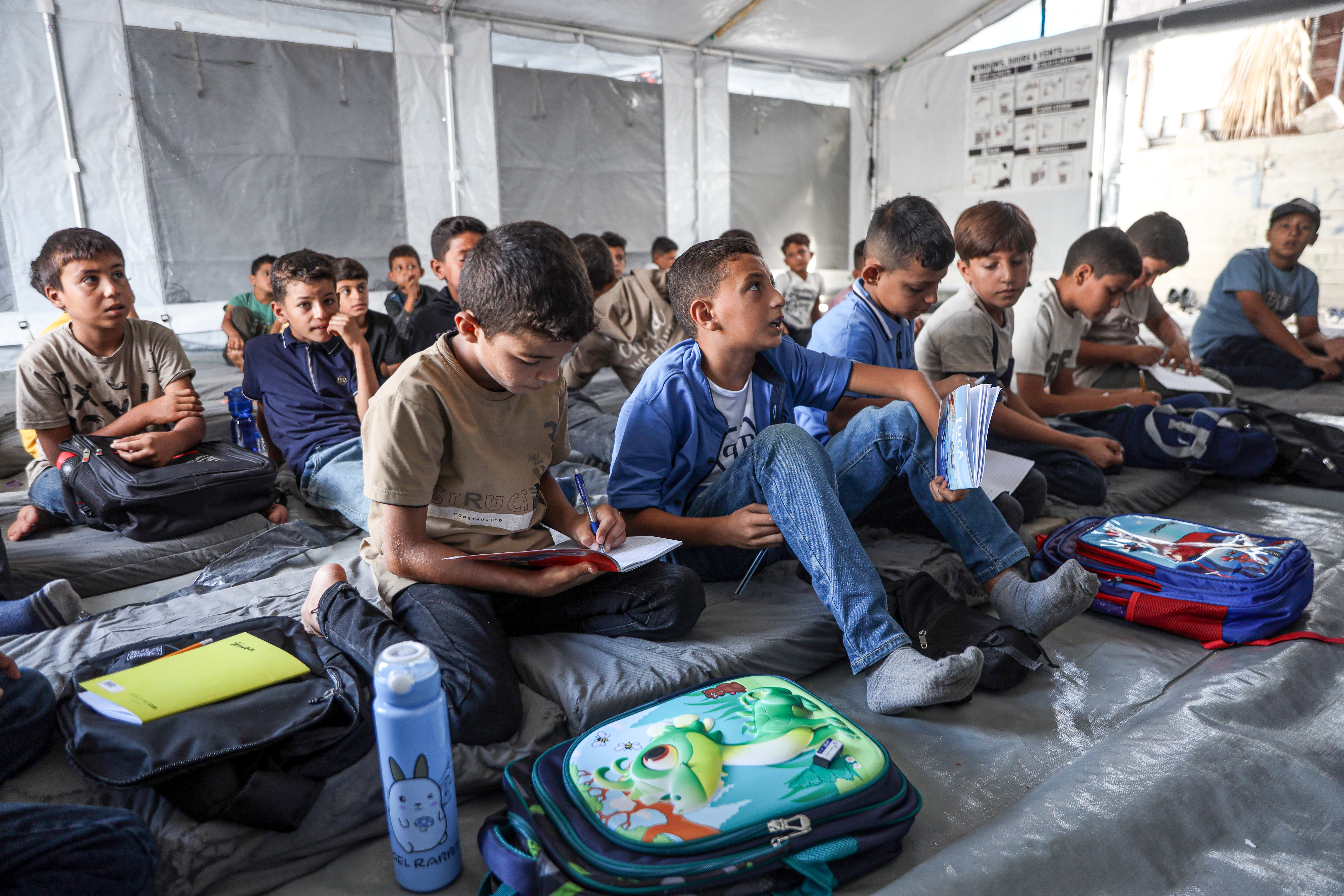 Around 541,000 students returned to education in Gaza as the new school year began on September 19, according to the Palestinian Ministry of Education [Abdelhakim Abu Riash/Al Jazeera]