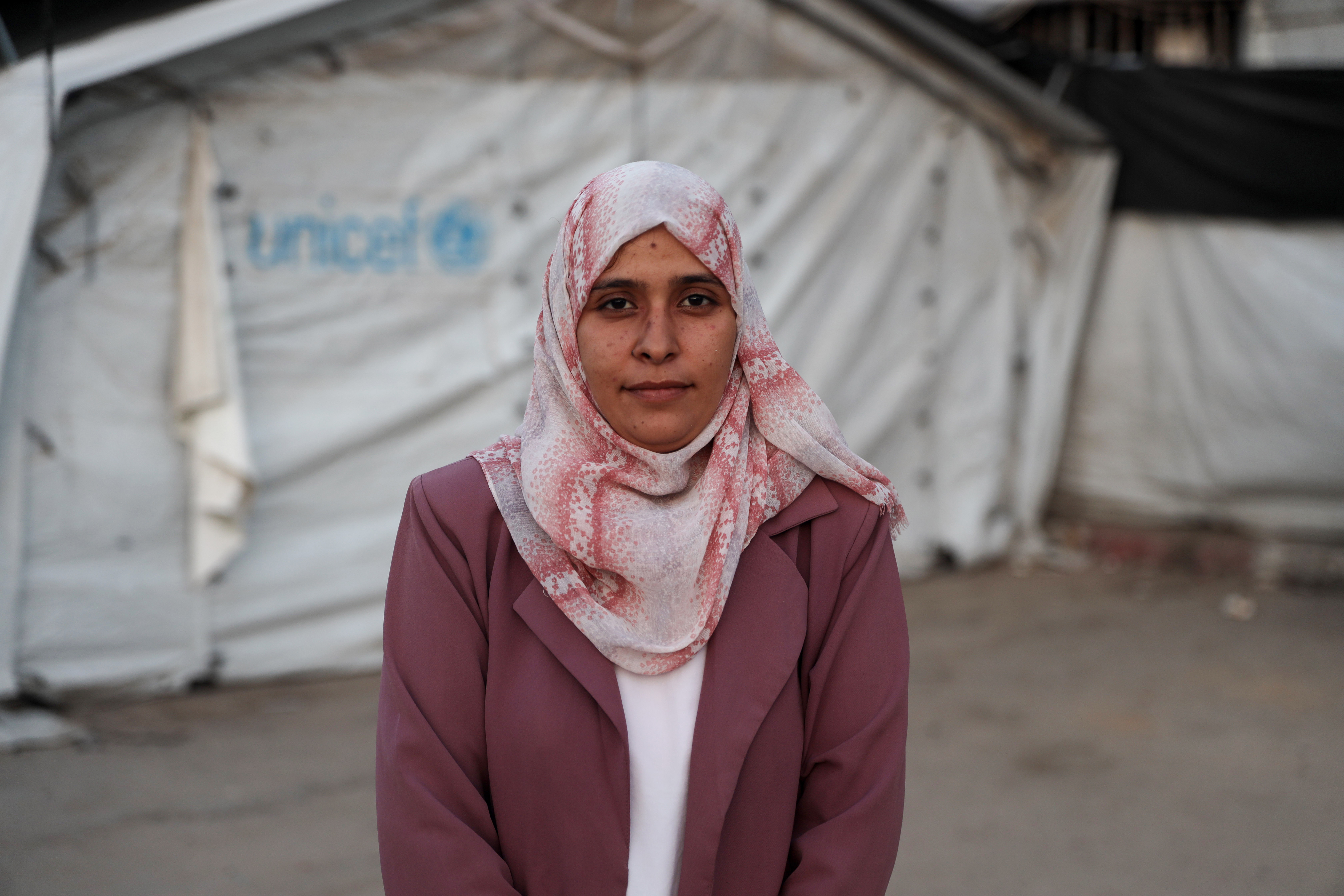 Maryam Al-Dabala, 30, fears the election could bring further displacement and worsening conditions in Gaza. [Abdelhakim Abu Riash/ Al Jazeera]