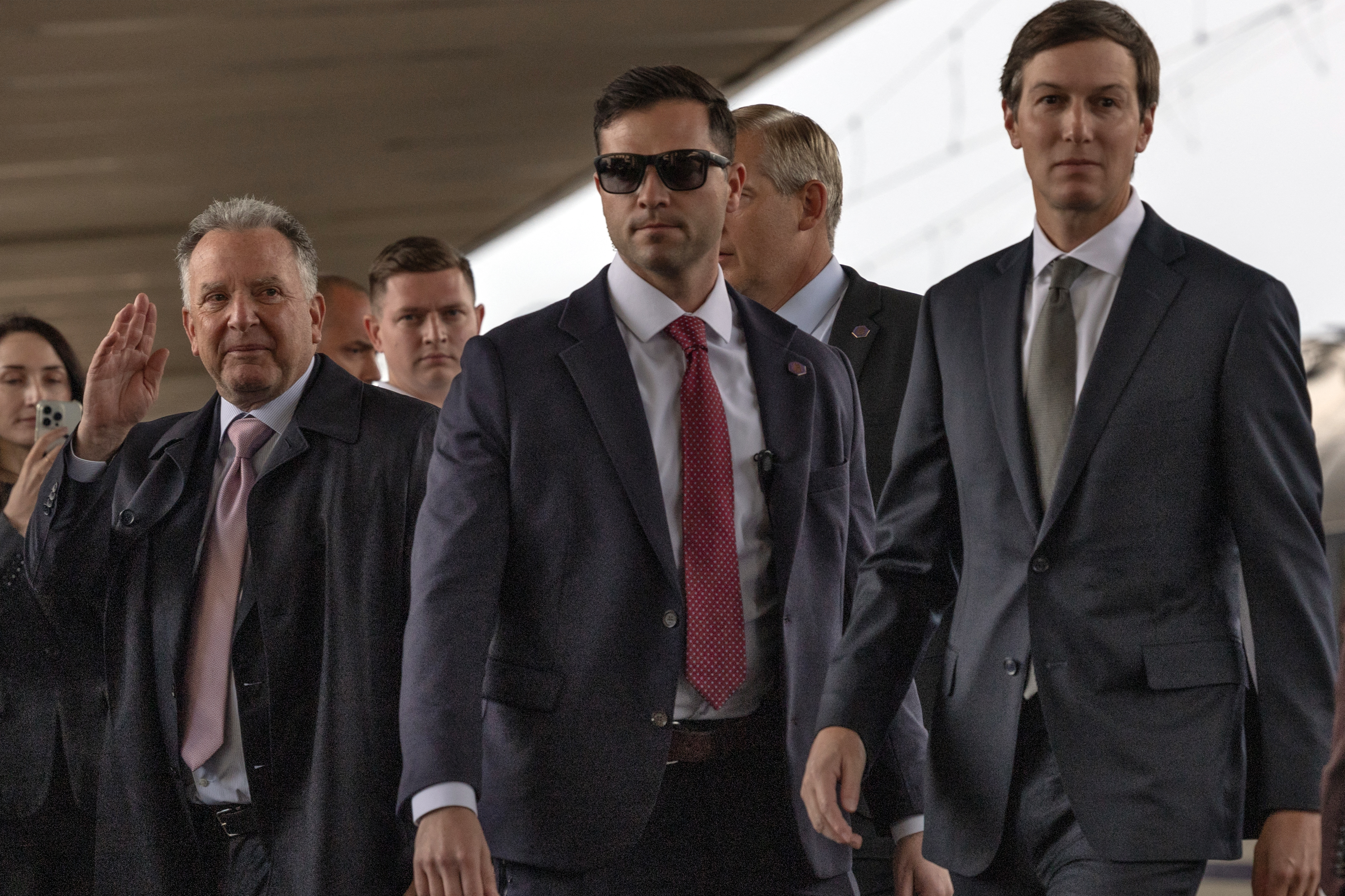US special envoys Jared Kushner (R) and Steve Witkoff (L) arrive at a railway station in Kyiv