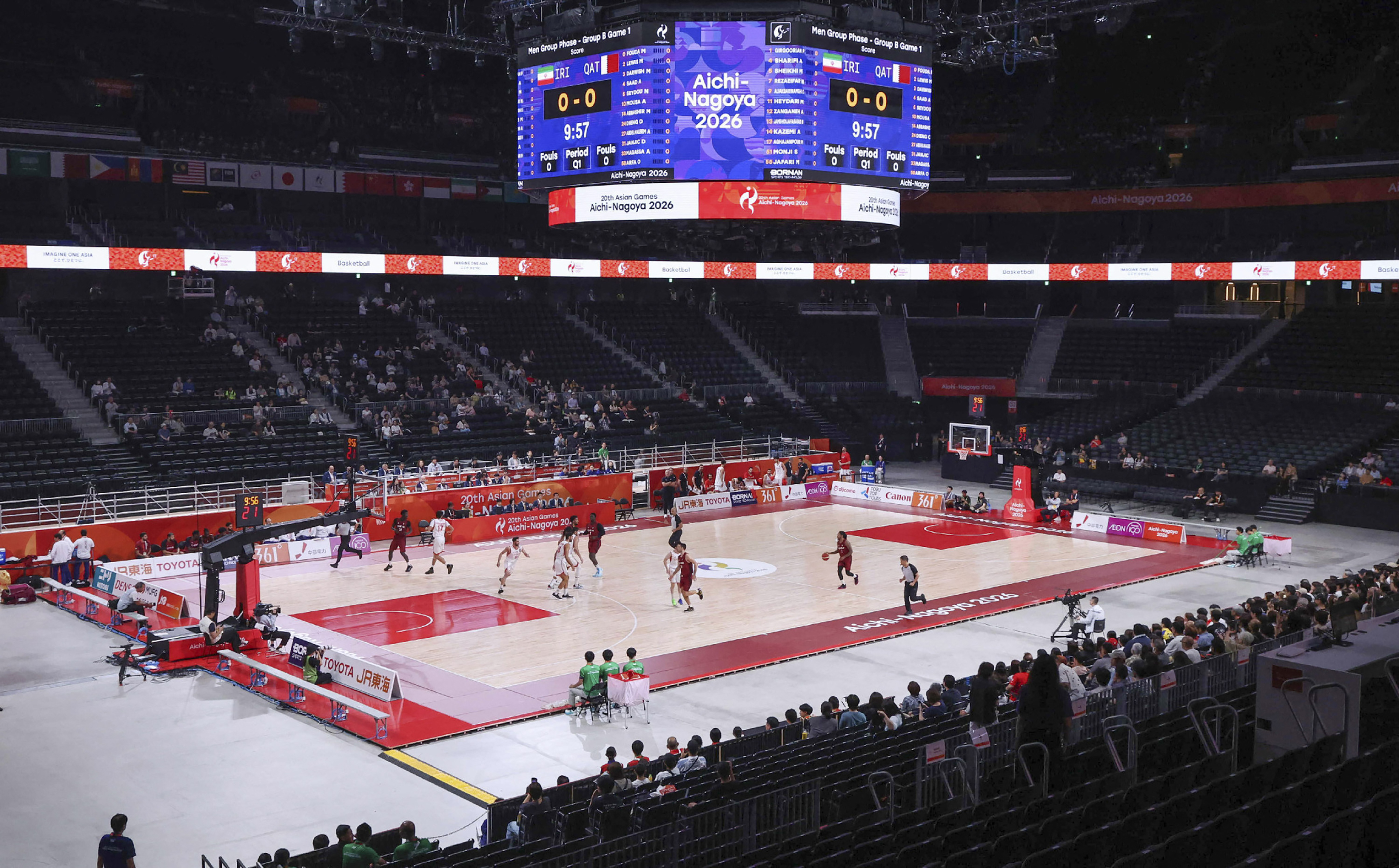 This general view shows players competing in the men's basketball Group B game between Iran and Qatar during the 2026 Asian Games in Nagoya on September 10, 2026. (Photo by JIJI PRESS / AFP) / Japan OUT